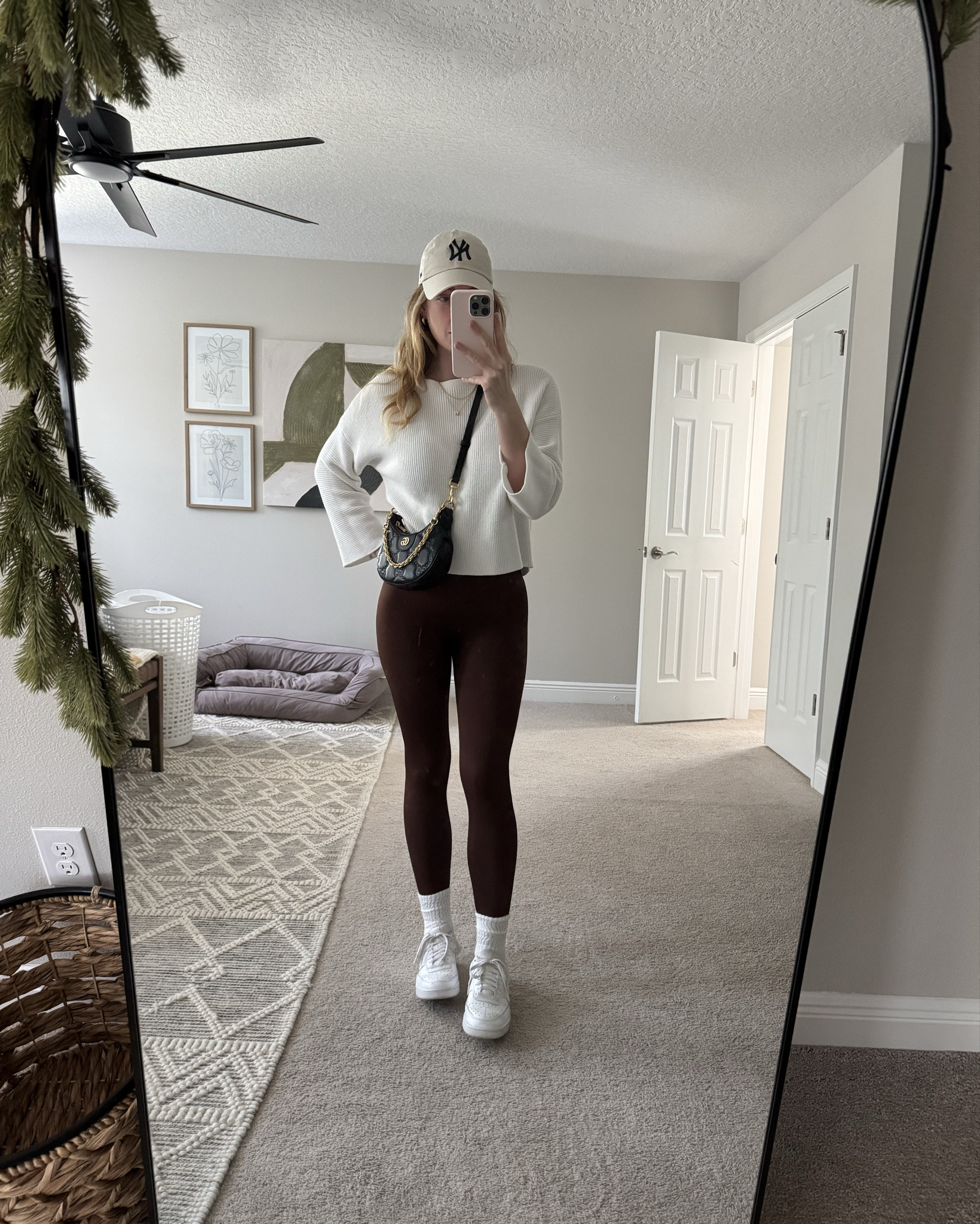 Coffee runs, gym days, travel fits, couch hangs 🤎 this brown athletic bodysuit is THAT girl 💅🏻 Layered with a cozy white sweater for that effortless off duty vibe, paired with white Nikes, slouchy socks, and my go to accessories for a look that moves with me all day 👟 Dress it up, break a sweat, or just lounging around obsessed with how versatile this fit is ✨ everything’s linked so you can easily add it to your cart (or gift list 👀) 

#athleisurestyle #offdutyfit #cozyandcool #everydayuniform #errandsoutfit #gymtolounge #travelfit #neutralvibes #fallathleisure #ltkstyle #styledcomfort

#LTKHoliday #LTKSaleAlert #LTKGiftGuide