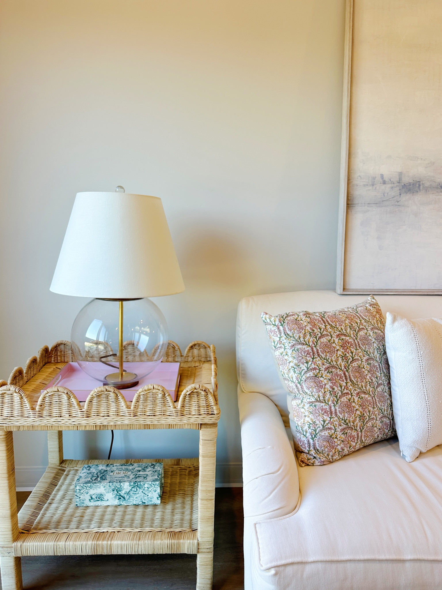 A little corner is complete in my living room in my new apartment! Lamp is Serena and Lily! The rattan table is Home Depot but unavailable currently!