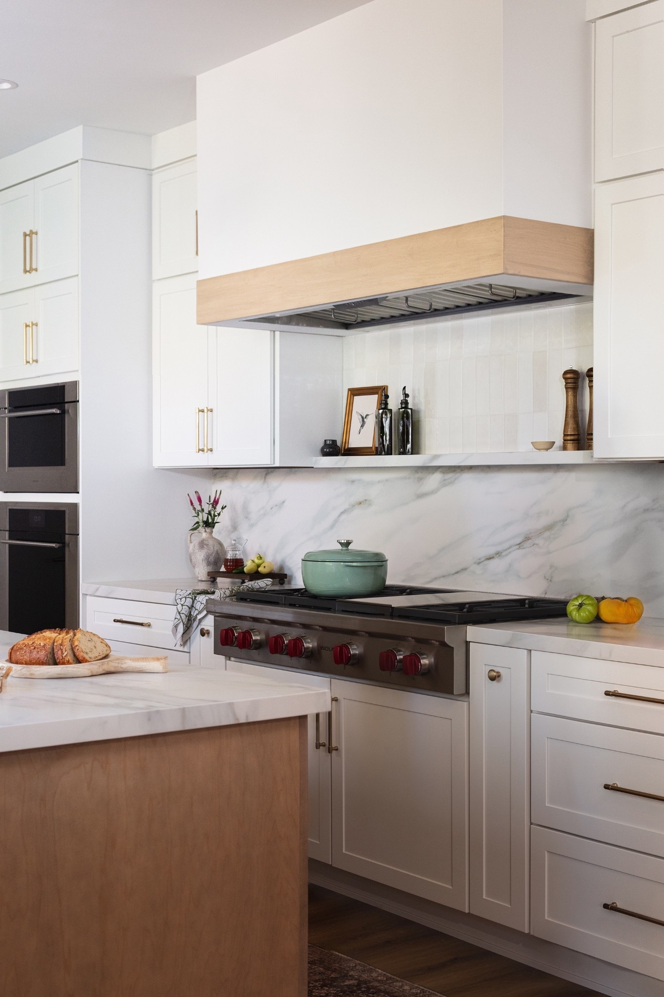 A modern white kitchen with plenty of warmth and character 

#LTKHome