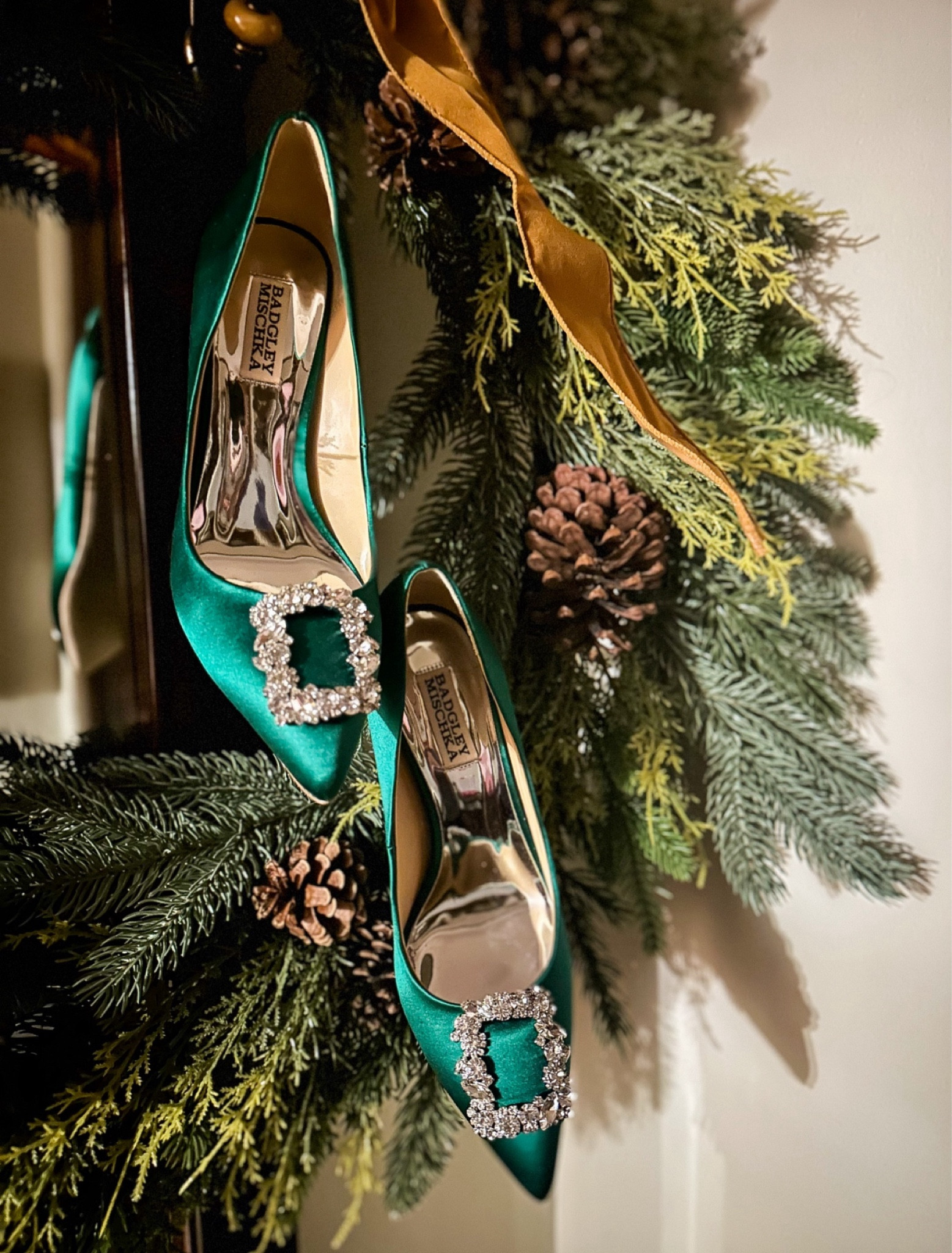 These Badgley Mischka green satin heels are so festive and ready to be worn for the holiday season. They run true size and the buckle embellishments will have you sparkling through the new year. A great choice to gift for the shoe lover on your Christmas list.

#LTKGiftGuide #LTKShoeCrush #LTKHoliday