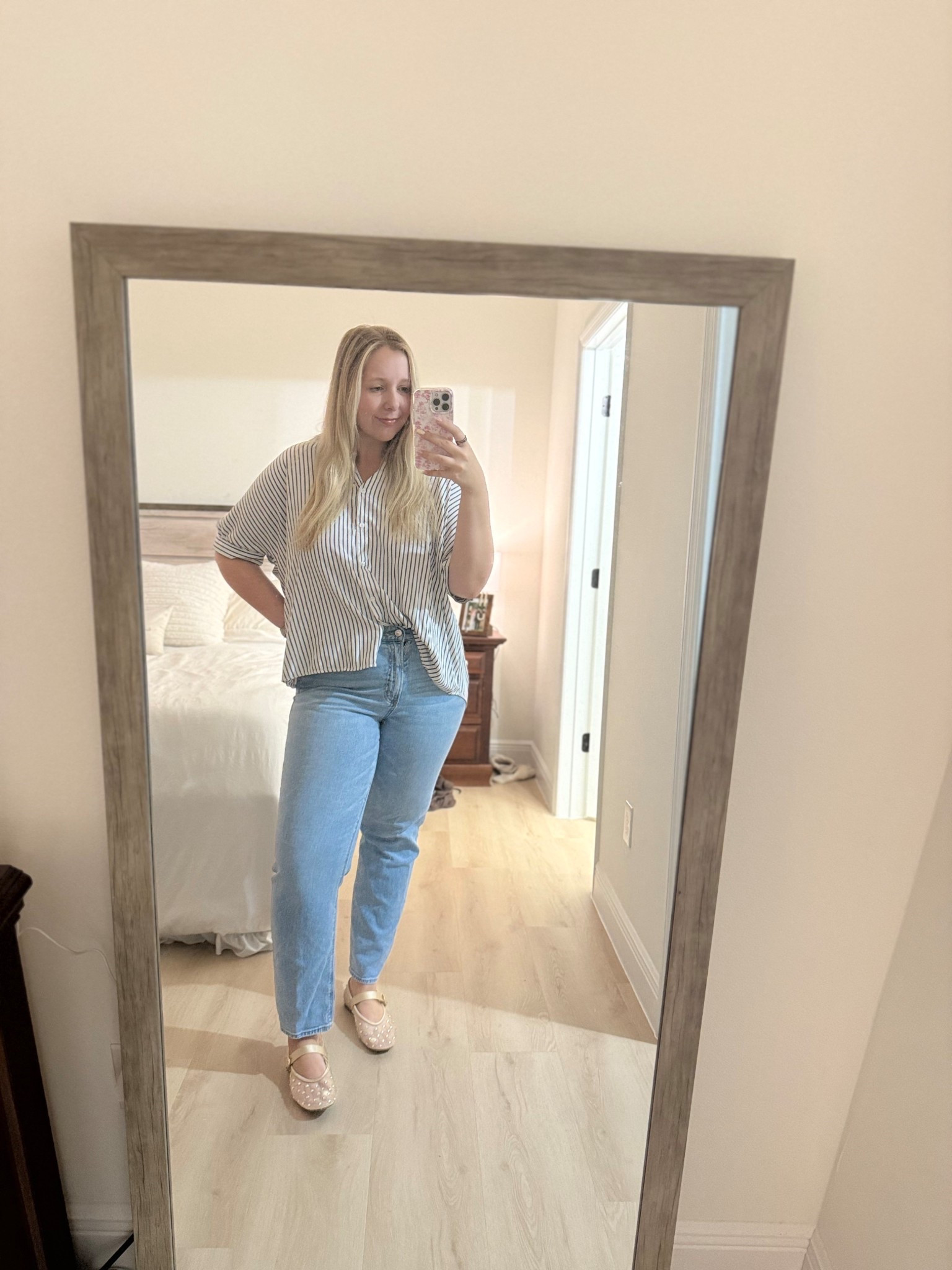Work outfit idea: jeans with oversized black and white striped button up shirt and crystal ballet flats. Casual office outfit, business casual style, and easy everyday look.

#LTKdayinmylife #LTKootd #LTKgrwm
