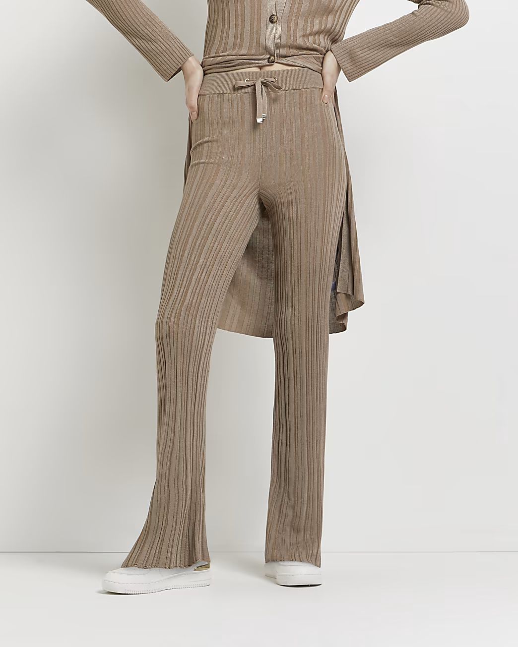 Brown knitted flared trousers | River Island (UK & IE)