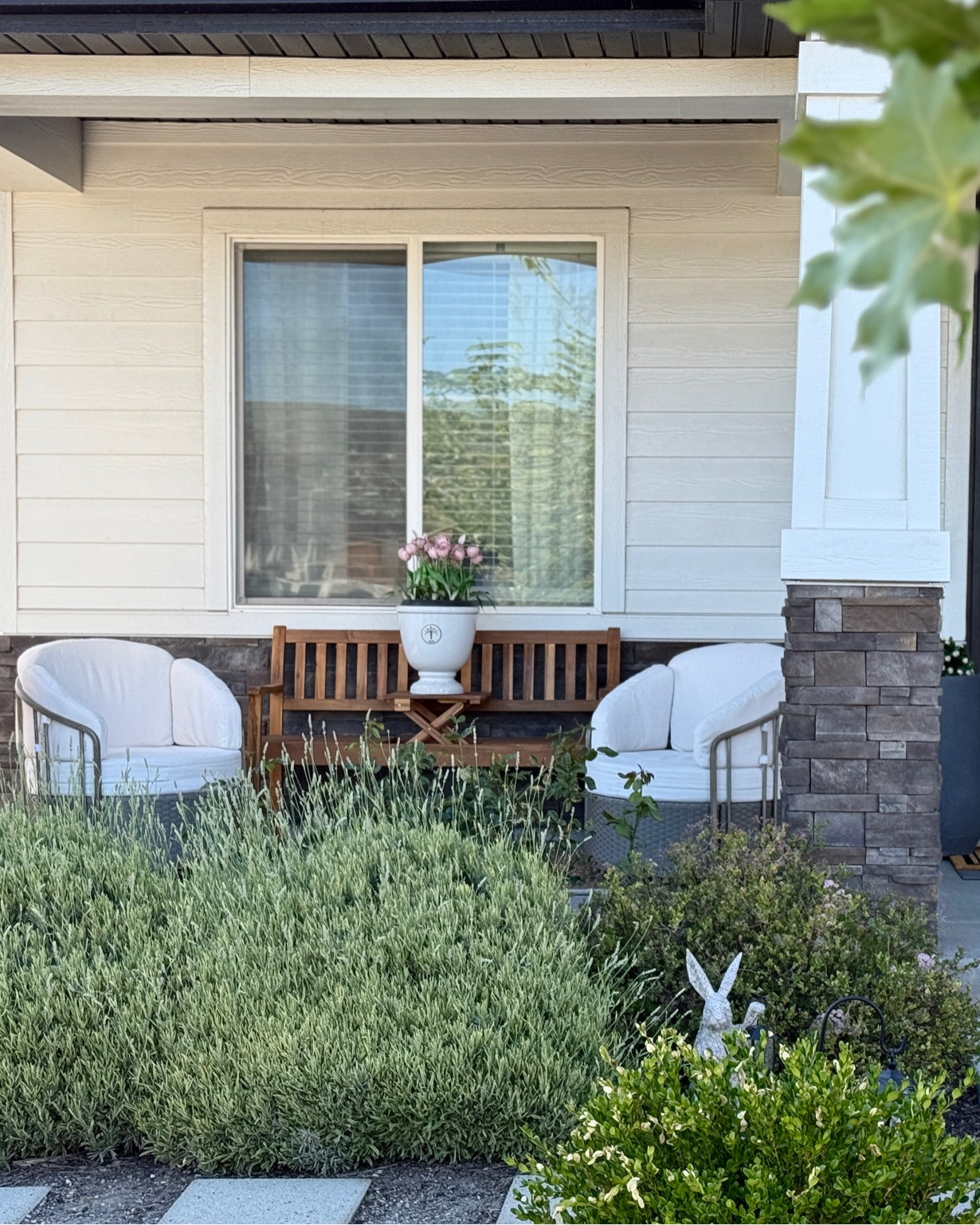 Gave a porch a little upgrade so there would be enough seats for us all to hang out together. I was so excited to find a bench with a built-in table so I could still add a vase of flowers in the center. 

Linked a few similar options!