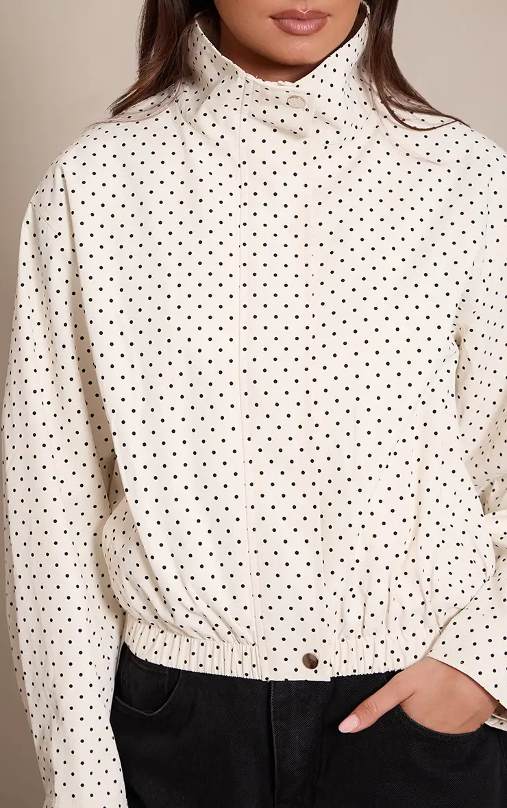 Cream Polka Dot High Neck Windbreaker | PrettyLittleThing UK