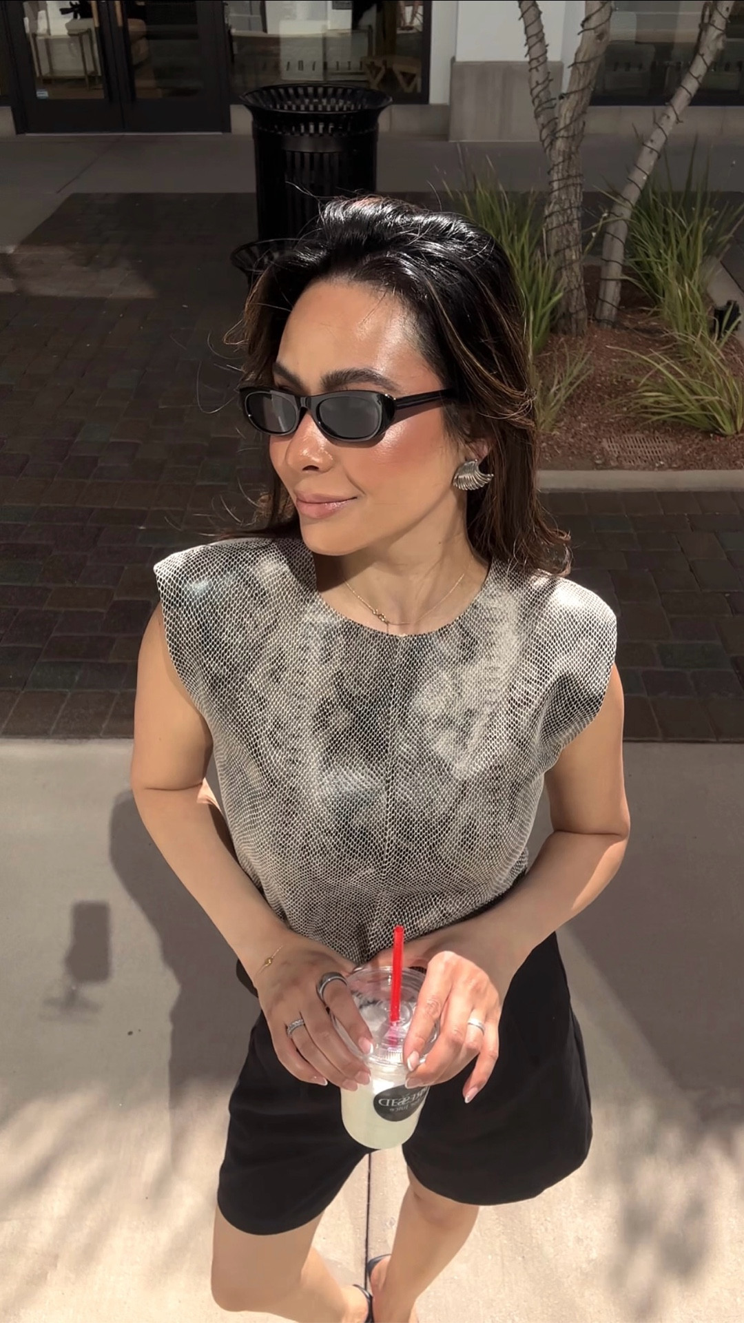 Long shorts  🫱🏽‍🫲🏽 python print top! Great transition fall outfit! 

#LTKSeasonal #LTKNYFW #LTKStyleTip