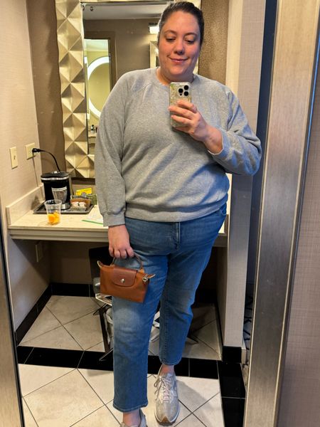 Love this Longchamp Mini. 

My sweatshirt is awesome. I bought a smaller size for a more fitted look, but it's so soft and feels vintage. It's sold out in this color, but there are a few other colors available. 

Jeans are a couple of years old, but linked the style  

#LTKplussize #LTKitbag