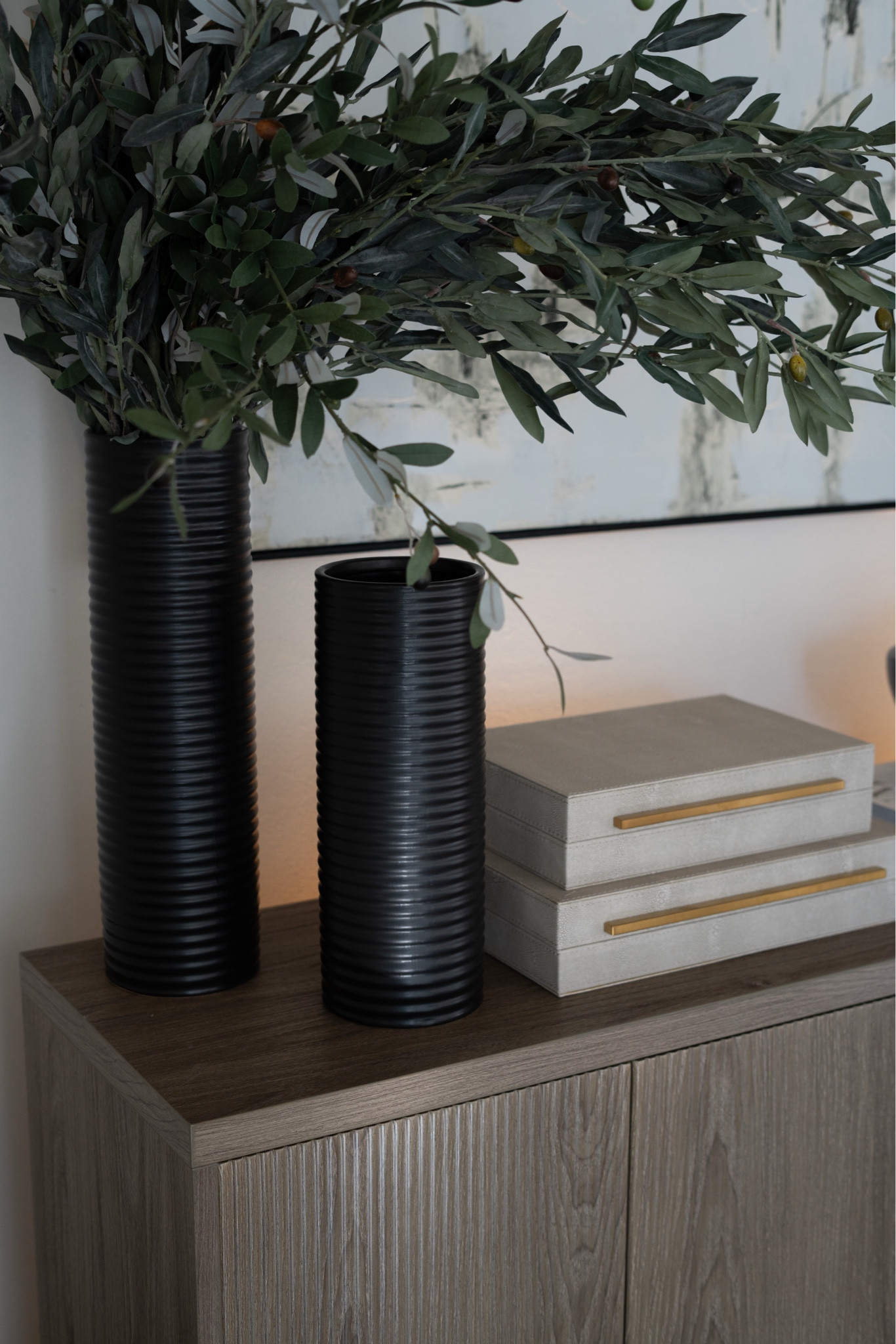 These tall vases and flowy olive branches add height and movement to any space!

#LTKMostLoved #LTKHome #LTKStyleTip