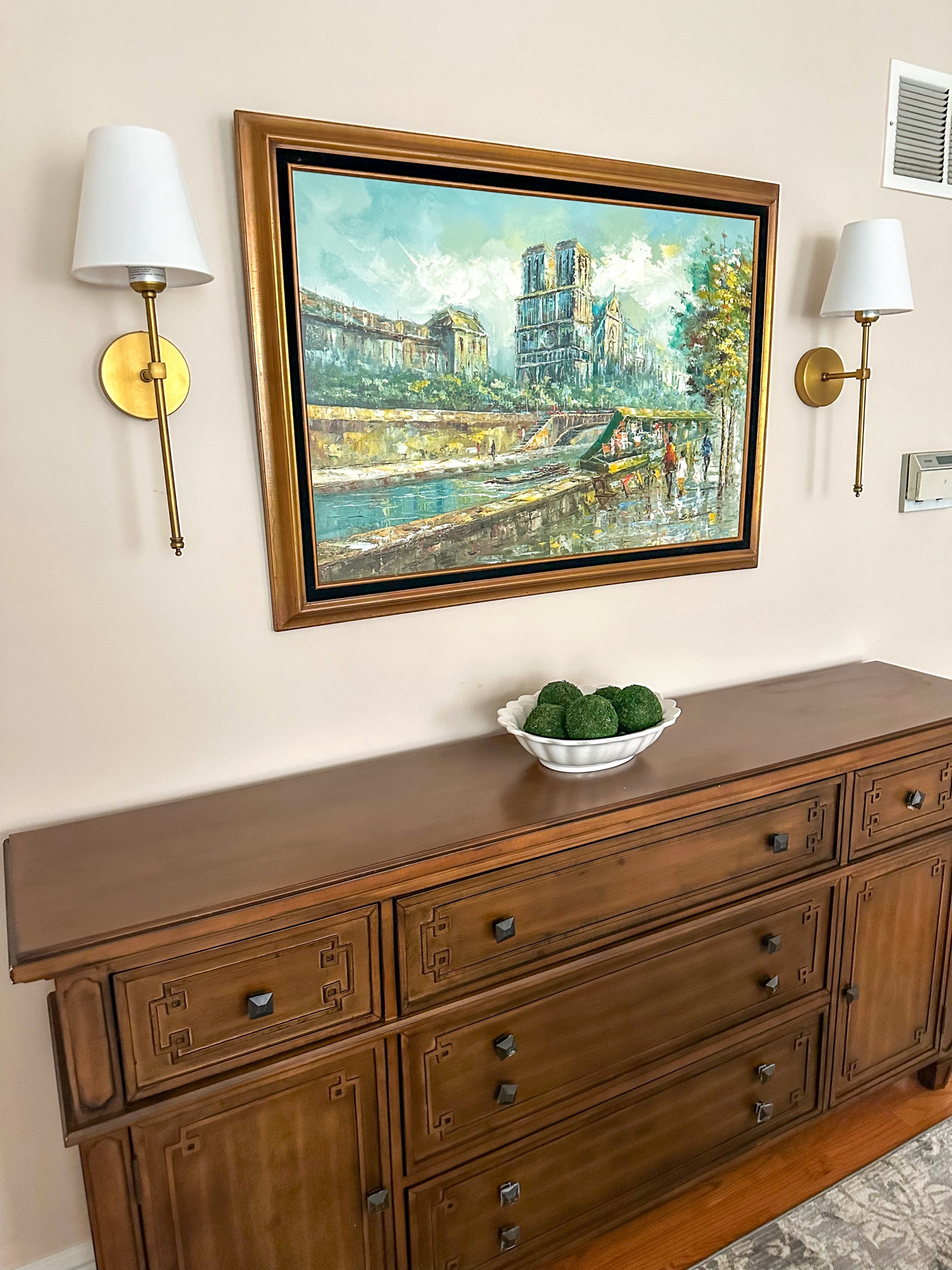 These gold sconces really completed this wall space in our dining room! They are on sale right now. Mine are not battery operated but I opted to use rechargeable bulbs instead of hardwiring. You can also purchase ones that come battery operated! 

#LTKHome #LTKStyleTip #LTKFindsUnder100