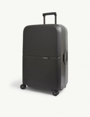 Magnum Eco Spinner recycled-plastic four-wheel suitcase 75cm | Selfridges