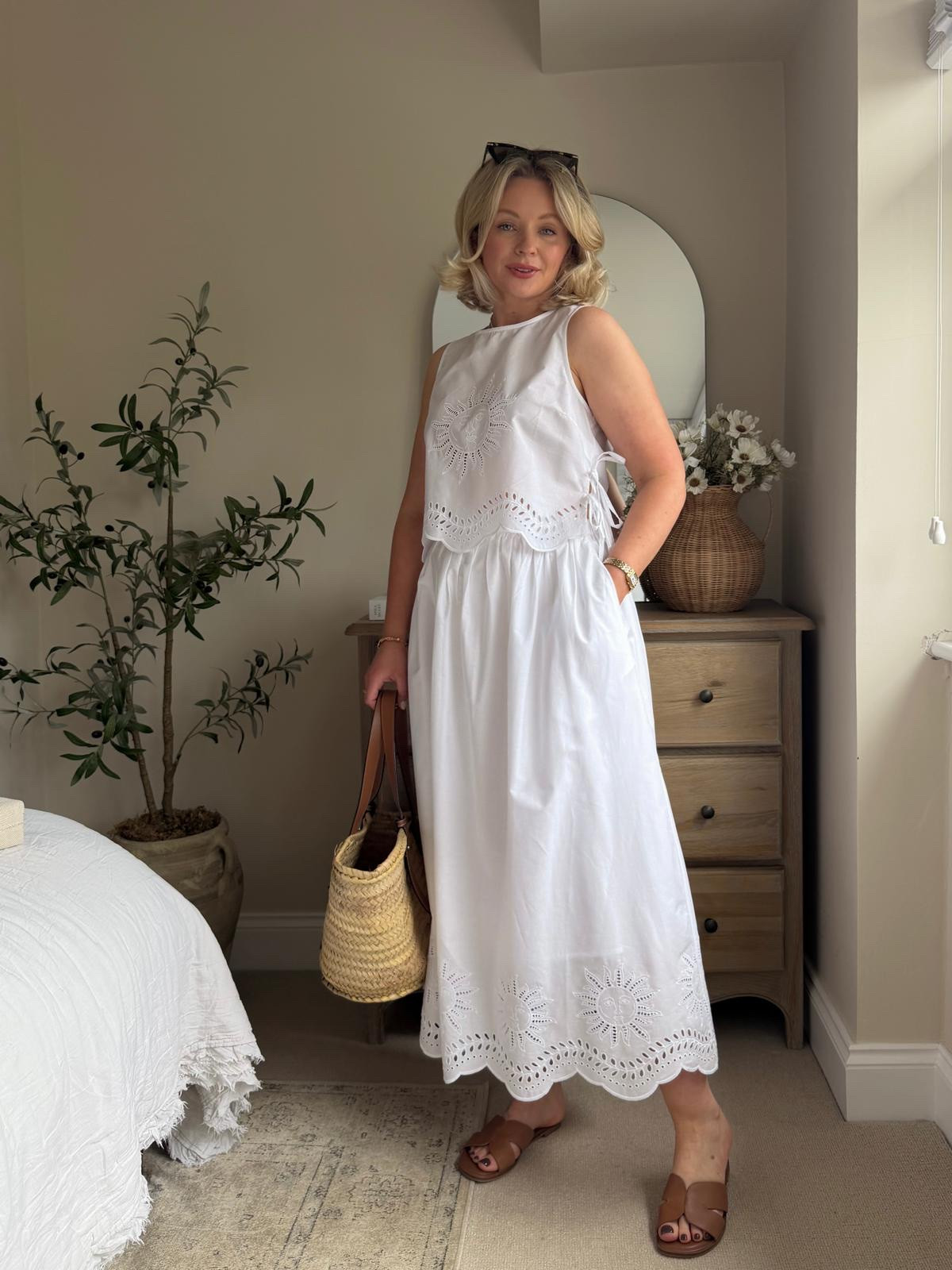 Midi Skirt Outfit Ideas! 

White Co-ord Set Capsule Wardrobe, Minimal Holiday Look, Effortless Day Outfit, Classic European Summer, Chic Casual Style, Loewe Raffia Bag, Tan Sandals 

 #LTKuk #LTKsummer #LTKeurope