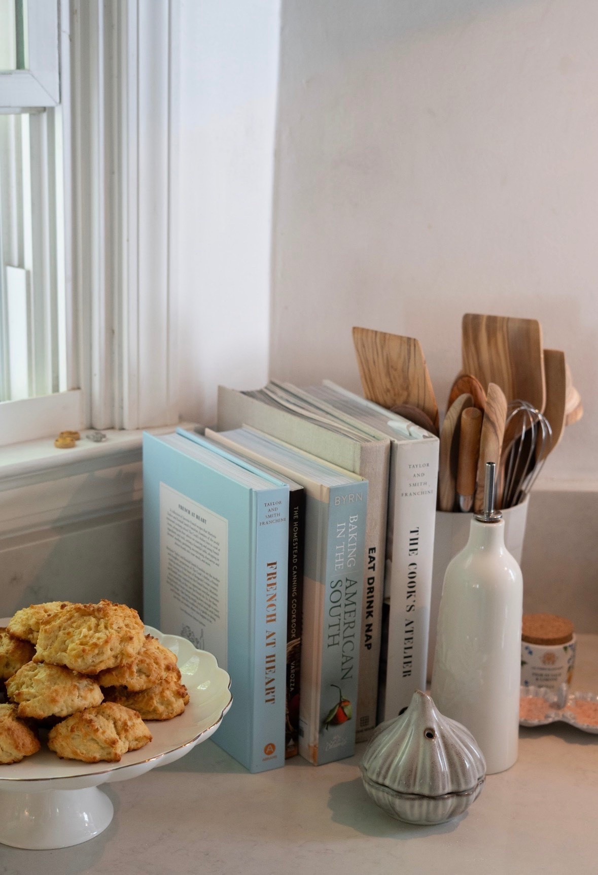 Ommgggg. Nothing makes me happier than a cozy kitchen corner filled with beautiful cookbooks, warm biscuits fresh from the oven, and all the little essentials that make a house feel like home!! I swear the soft blues, natural wood tones, and collected textures make cooking feel so much more inspiring.

#LTKHome #LTKSeasonal #LTKfoodie