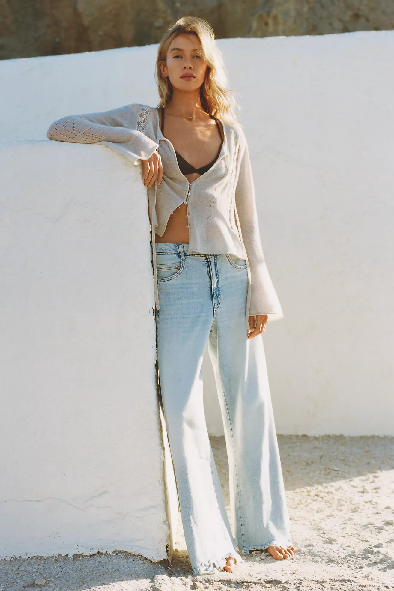 The Adi Regenerative Cotton Mid-Rise Flare Jeans by Pilcro | Anthropologie (US)