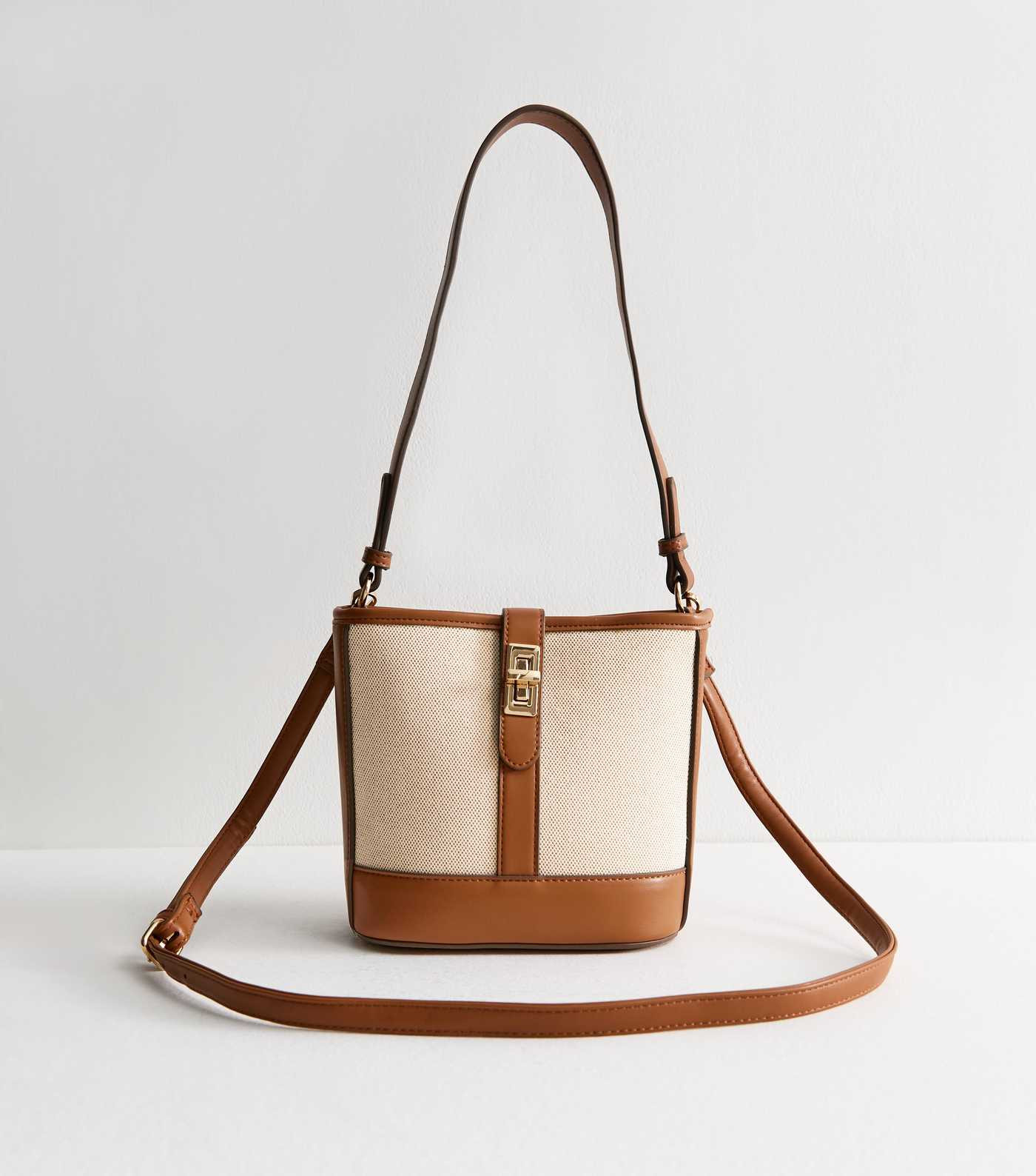 Brown Faux Leather Twist Lock Canvas Bucket Bag | New Look | New Look (UK)