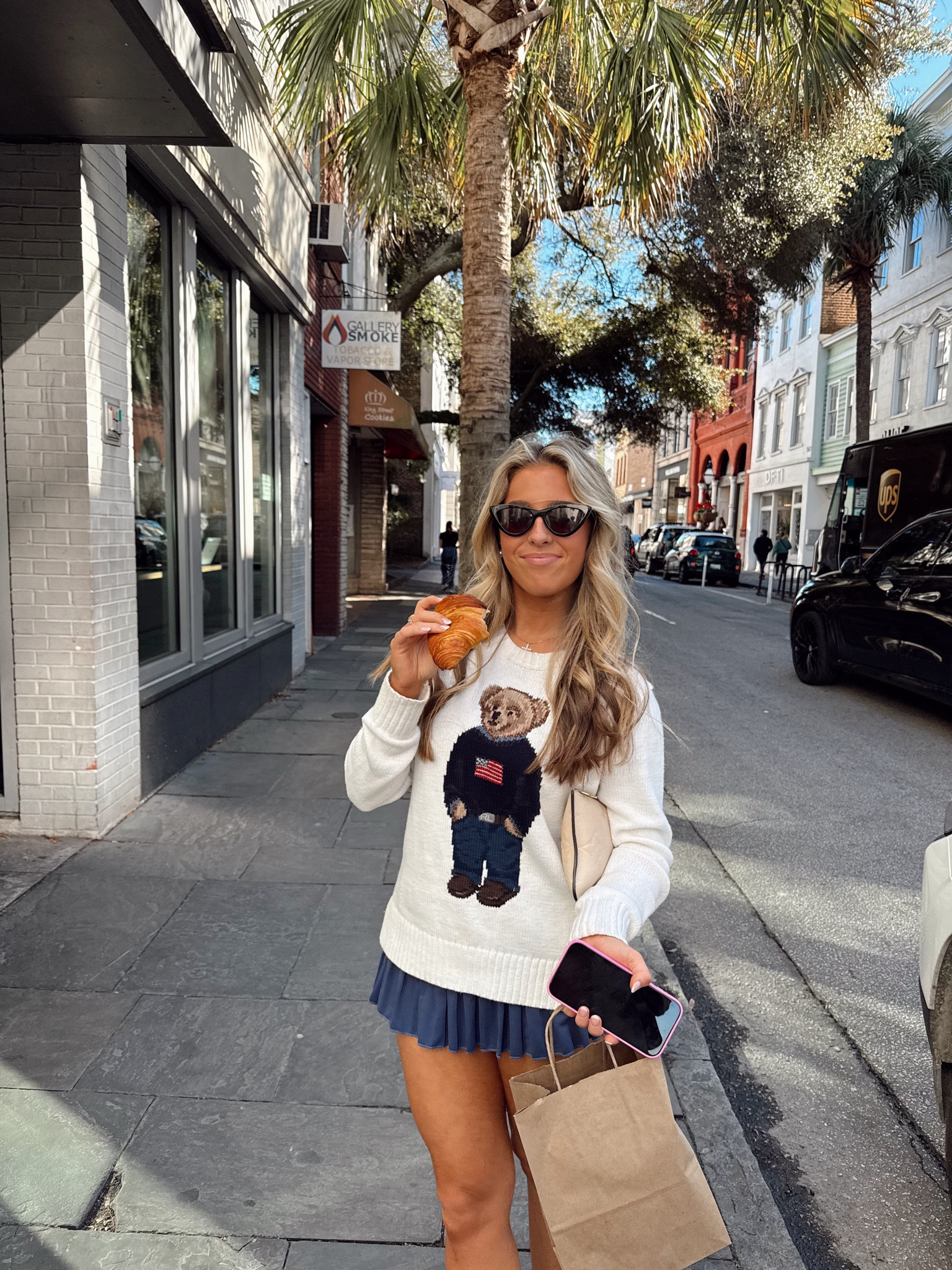 Enjoying the warm weather in Charleston! LTK U | daily outfit inspo | preppy outfit inspo | preppy style | preppy fashion | Ralph Lauren sweater | Ralph Lauren bear sweater | bear sweater | gold hinge skirt | tennis skirt | chic tennis skirt | preppy tennis skirt | January fashion | January ootd | j crew sunglasses | Charleston fashion | Charleston style | Charleston ootd 

#LTKootd #LTKPetite #LTKU