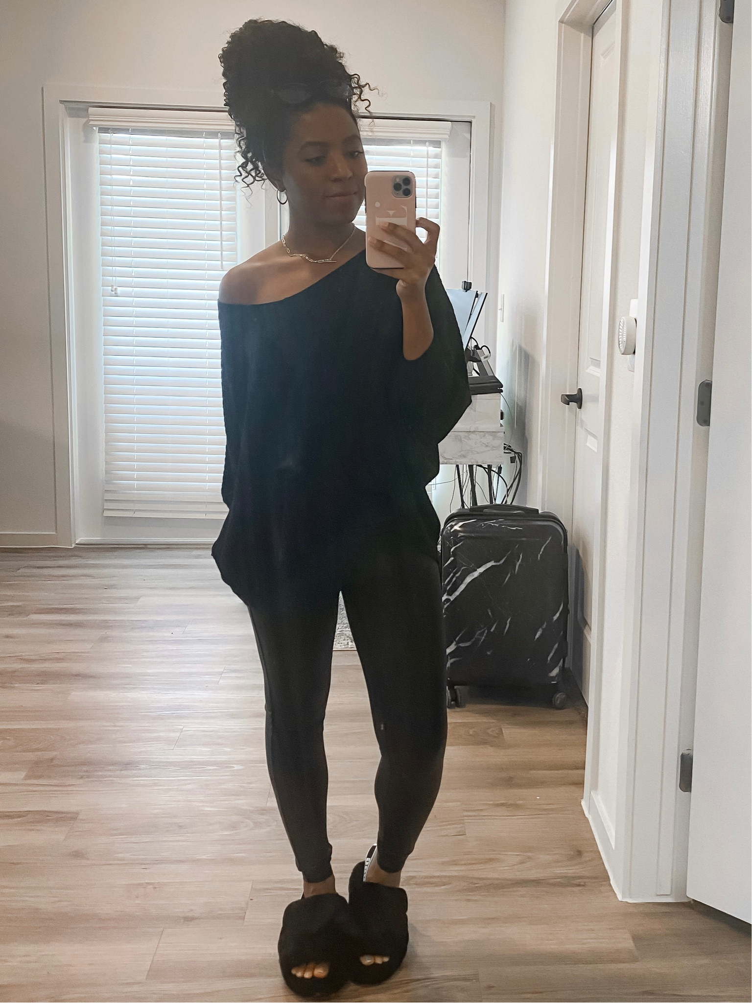 First day back at work and keeping it cozy for my work from home look today in an oversized sweater, leather leggings, and my new favorite slippers  

#LTKworkwear