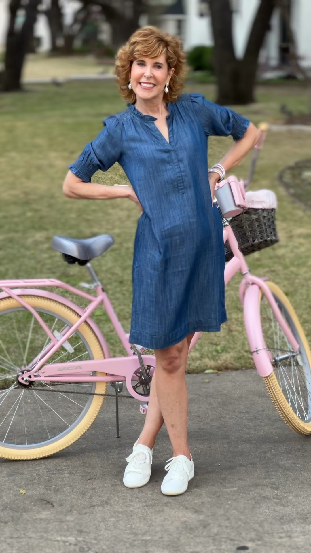 This summer dress is so versatile! It's a Tencel denim shift dress, with a sweet ruffled collar and smocked elbow length sleeves!
I paired it with pearl earrings, a pearl Apple Watch band and white platform sneakers for a cute and casual look that works for errands, a walk around the neighborhood, or even a bike ride!
I'm 5'5" and l'm wearing a
Petite in this dress.


#LTKstyletip #LTKSeasonal