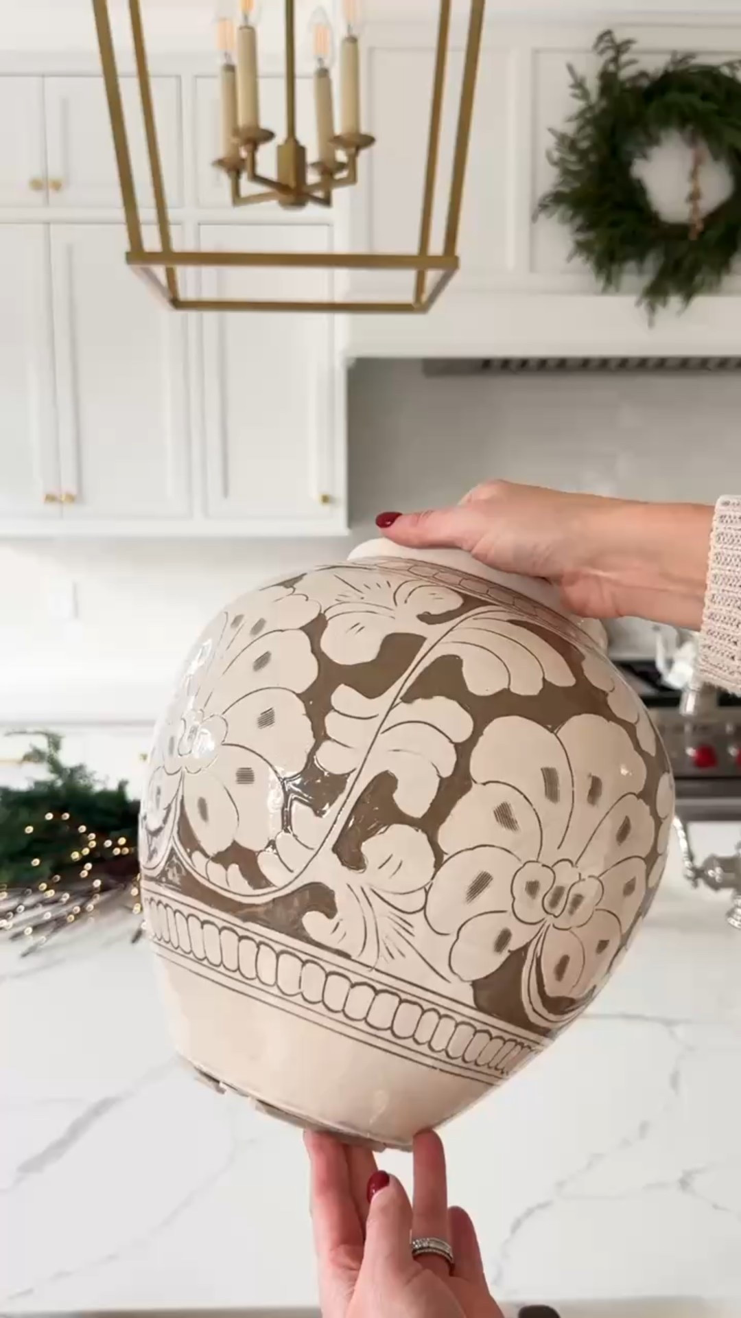 Obsessed with me new cream and white vase - I have it styled on my kitchen island with faux cedar stems and battery operated light up branches. 

#LTKSeasonal #LTKHoliday #LTKHome