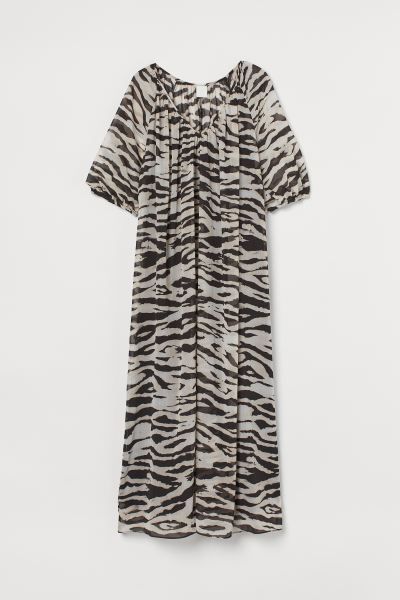 Long, A-line dress in woven fabric. Low-cut V-neck, 3/4-length raglan balloon sleeves, and narrow... | H&M (US + CA)