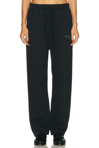 Fear of God ESSENTIALS Fleece Relaxed Sweatpant in Black | FWRD 