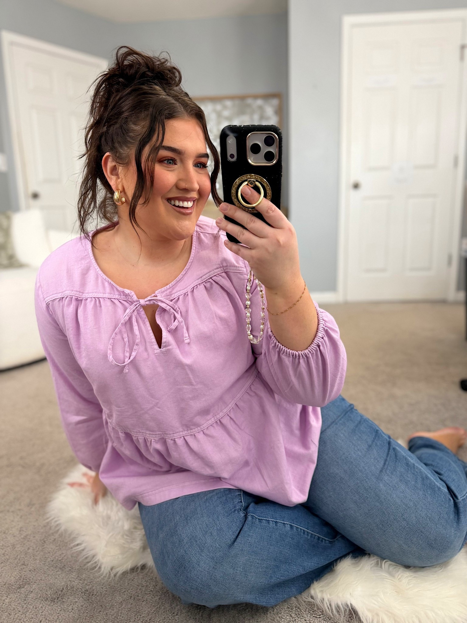 Phone case + mag safe accessories 📱🖤✨ IPhone 17 wristlet beaded charm, gold glitter ring kickstand + black rhinestone case @katespade 
Wearing my cutie lavender blouse from @lanebryant 

#LTKPlusSize #LTKootd #LTKSaleAlert