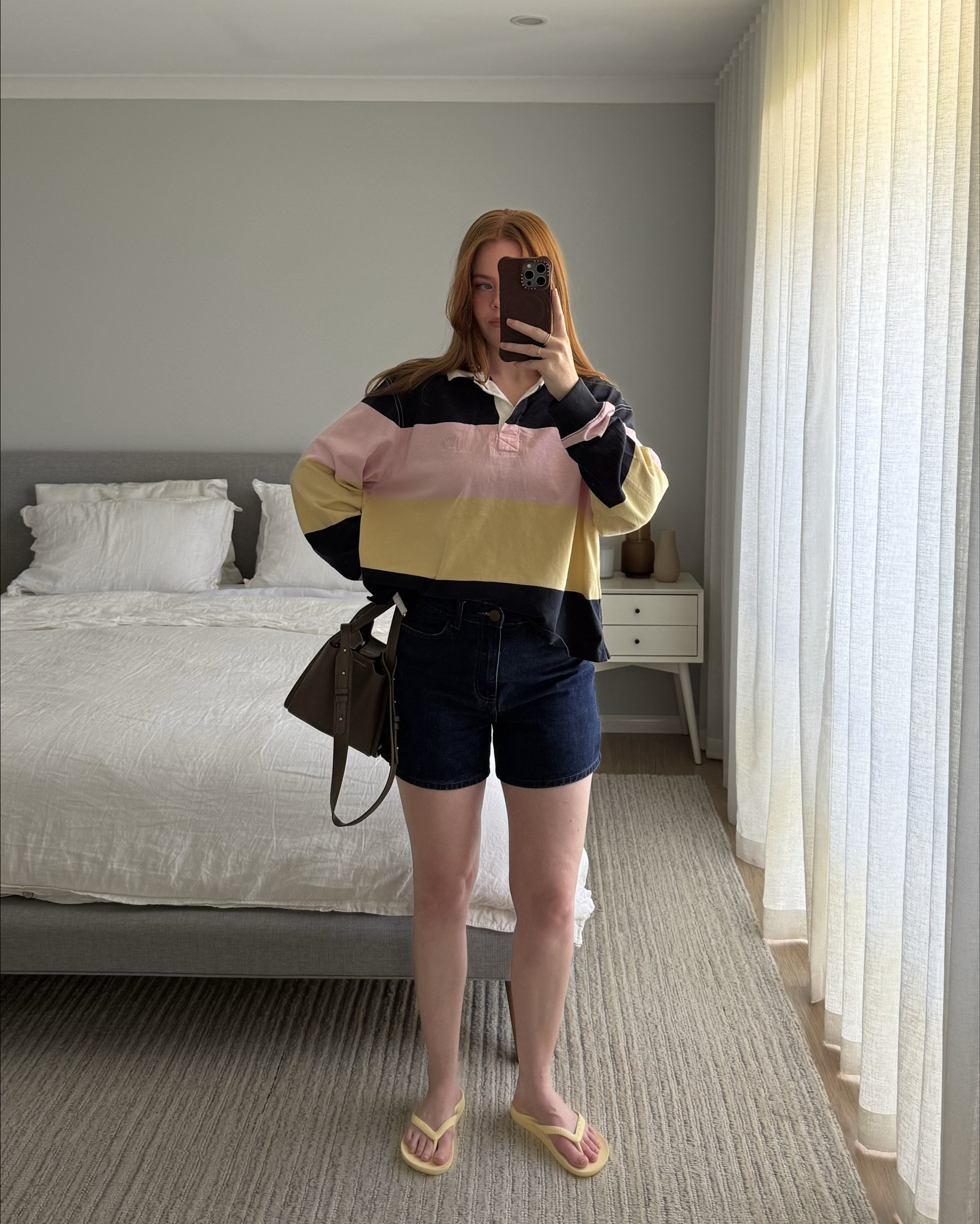 A rugby jumper, indigo denim jeans and thongs for the perfect casual summer outfit combination.

#LTKaustralia #LTKsummer