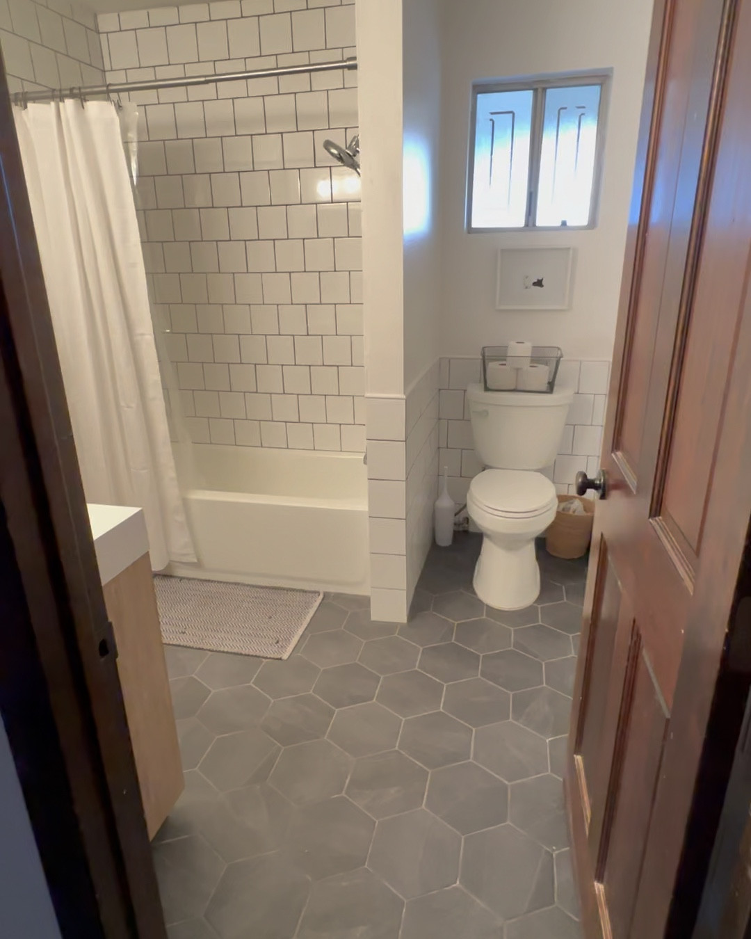 Romeo’s bathroom came straight from the 70’s and not in a good way. We started fresh and went with classic styles like 4x4 white tile, hex floors, and new vanity with chrome finishes. 

#LTKkids #LTKhome