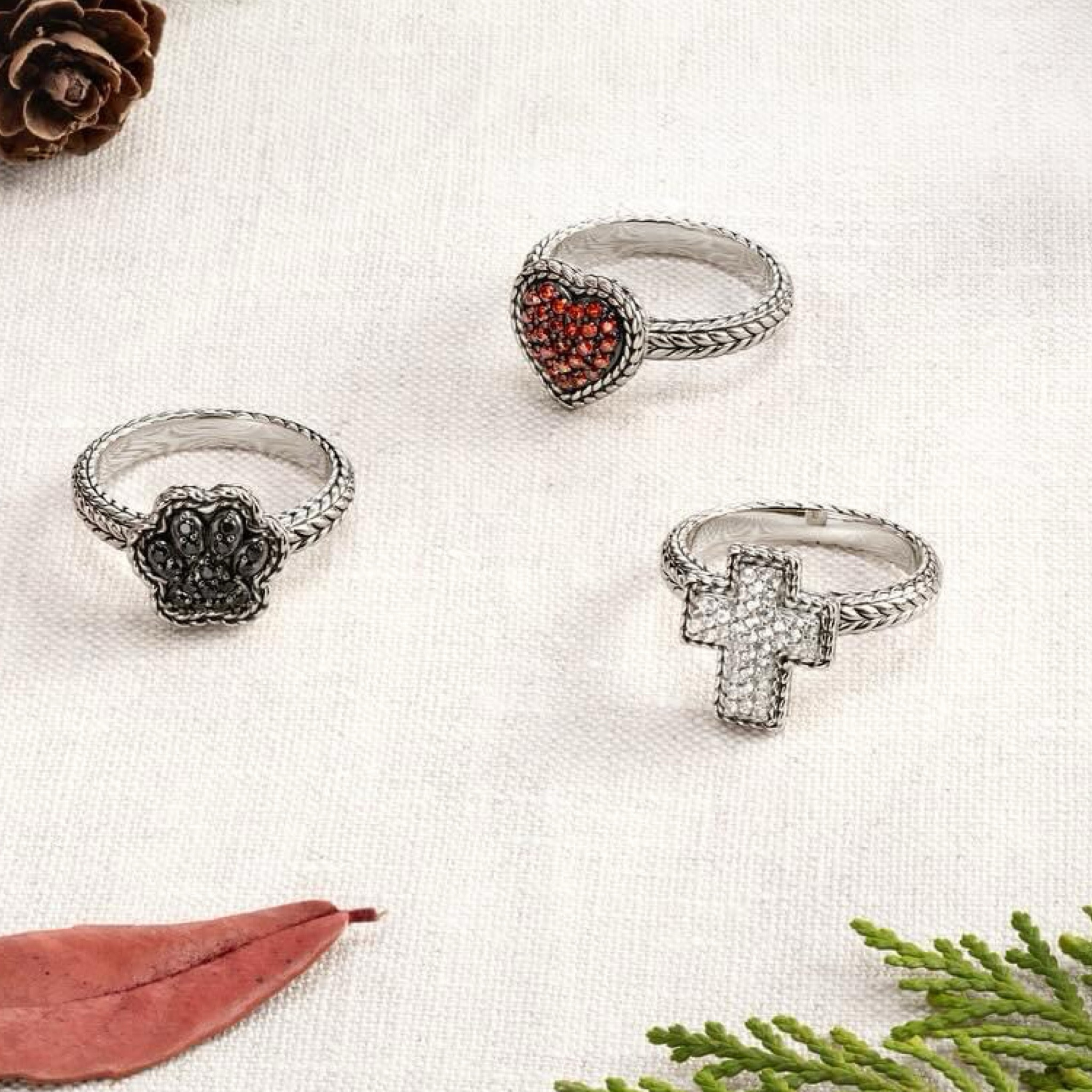 Beautiful pave and sterling silver jewelry from JAI. These silver rings feature a choice of heart, paw print or cross. Genuine gemstones add the sparkle and color! 

#LTKGiftGuide #LTKHoliday