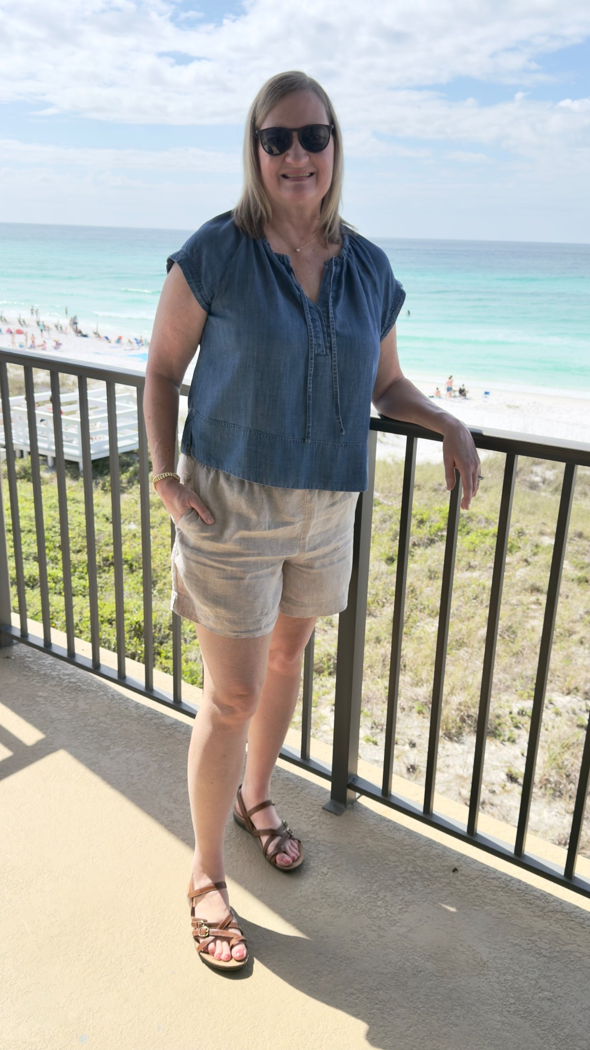 Taking a break at the beach on 30A! ☀️What I’m wearing today for a bit of shopping, eating fresh seafood and relaxing: chambray top, linen shoes, comfy walking sandals and minimal jewelry. 