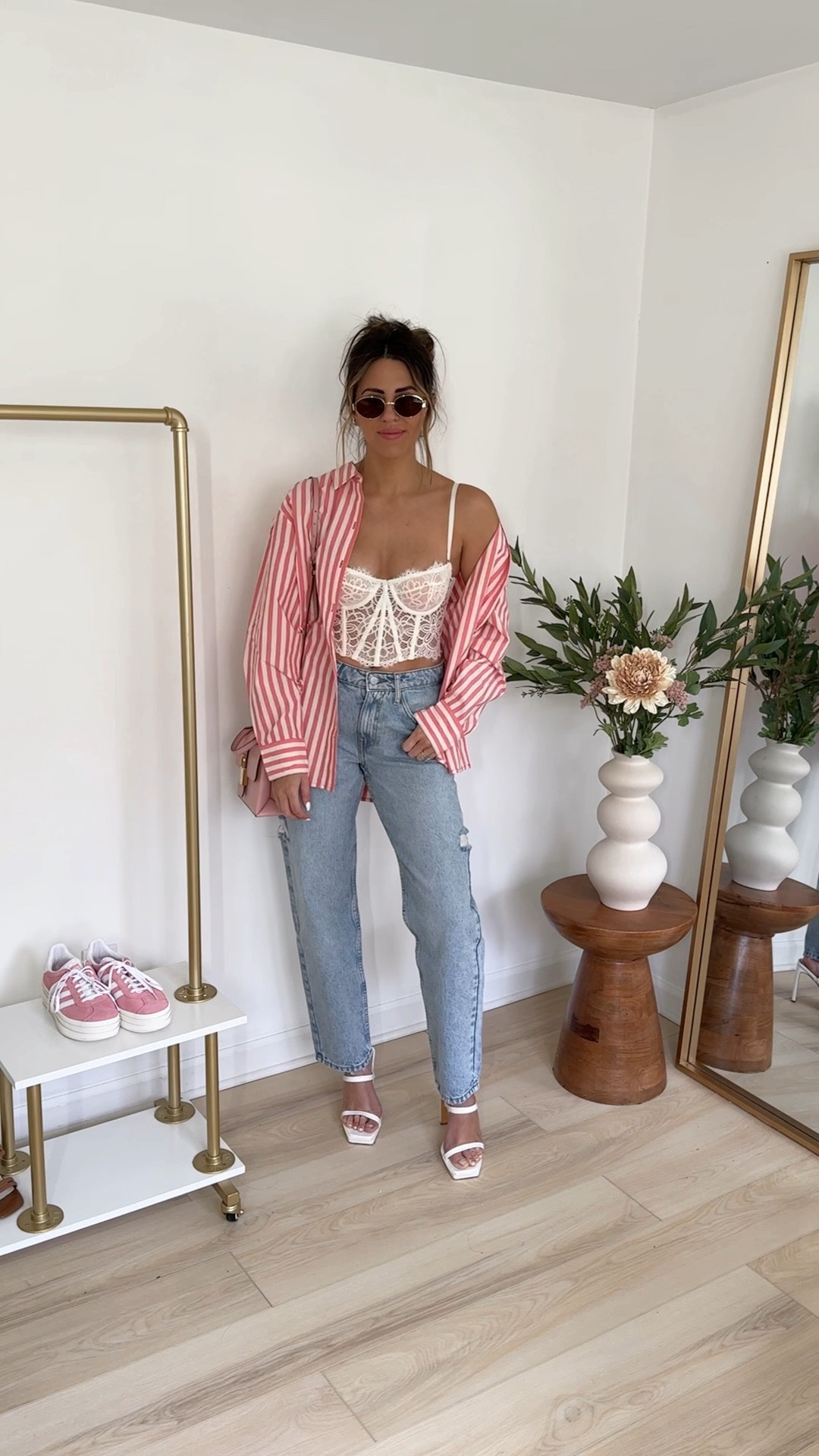 One base styled five ways: styling this lace corset tank (small) and denim jeans (26)... PS you will def need to wear nipple covers / little bra inserts to cover the nips like I did 🤭❤️

Outfit 1: paired it with a red oversized button up (medium) and heels

Outfit 2: paired it with a sweater vest (small)

Outfit 3: paired it with a colorful striped short sleeve button up (small)

Outfit 4: paired it with an oversized cardigan (large) and pink sneakers 

Outfit 5: paired with a classic blazer (small) and heels 

Spring outfits | what to wear this spring | elevated chic outfit ideas | brunch outfit 

#LTKstyletip #LTKfindsunder50 #LTKVideo