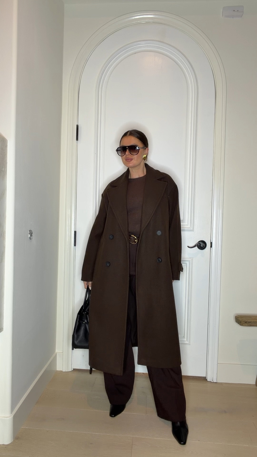 Styling an espresso brown coat with a brown sweater, wide leg pants, a black leather tote and black booties. Adding black sunnies and gold jewelry to elevate the look 
#coat #widelegpants #brown #espressobrown #darkbrown #chocolatebrown #bootie #boots #black #tote #winter #fall #outfit #aviators #zara #mango #tomrford #demellier #staud  

 

#LTKWorkwear #LTKootd #LTKFindsUnder50 #LTKFindsUnder100 #LTKgrwm

#LTKSeasonal #LTKTravel #LTKSaleAlert