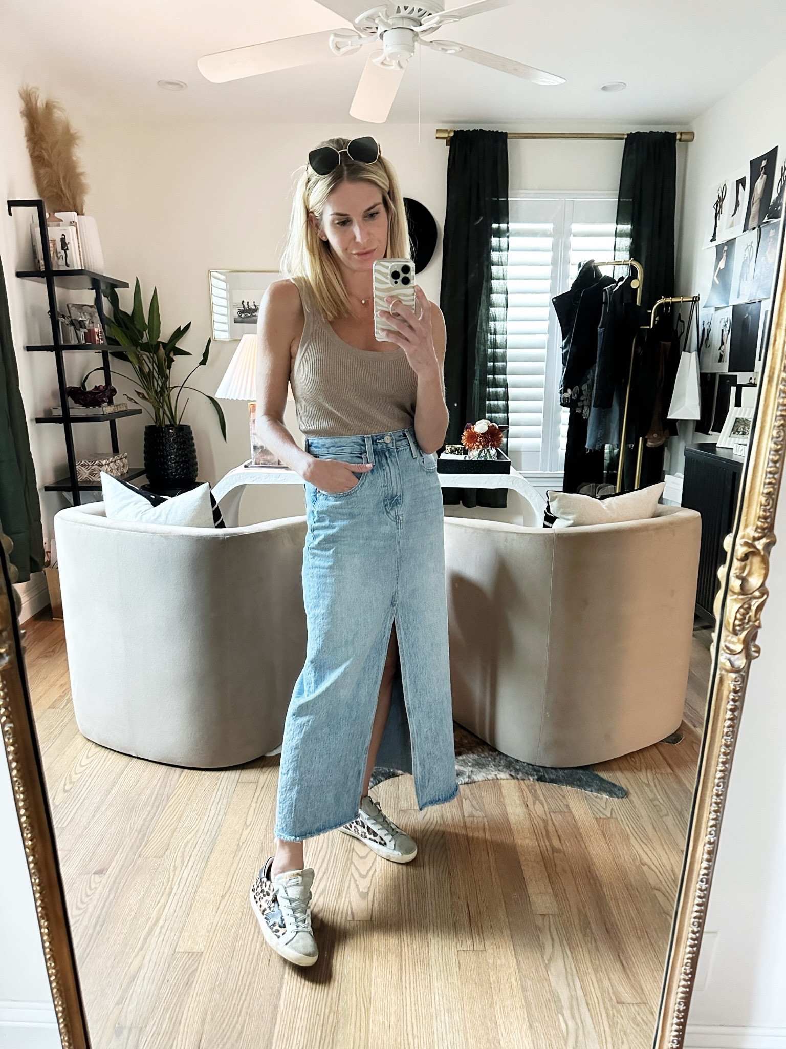 Loving this denim midi skirt for fall! 

Similar ribbed knit tank, leopard golden goose sneakers, and Fendi sunglasses. 

#LTKSeasonal #LTKshoecrush #LTKstyletip