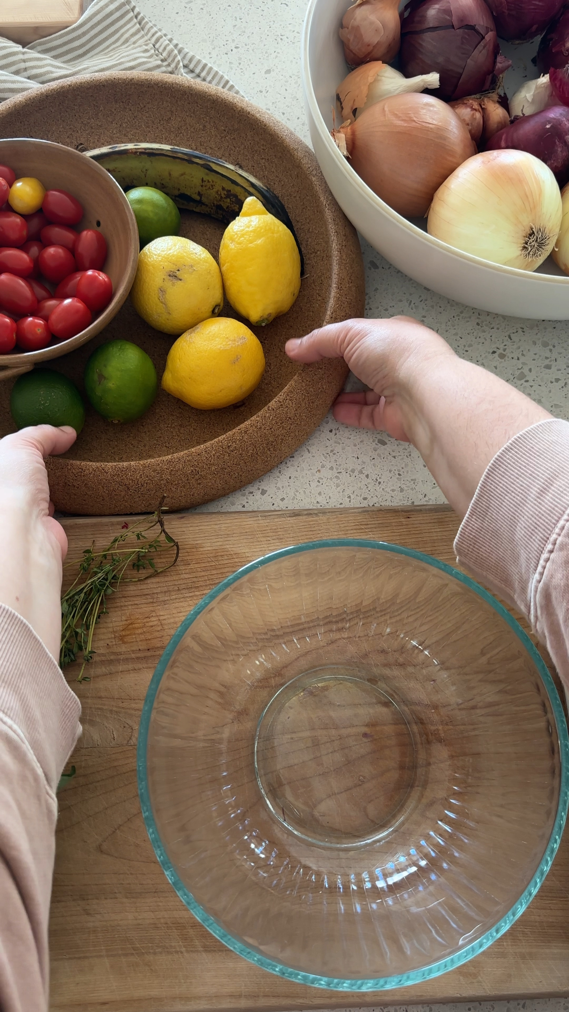 My Emile Henry Cork & Ceramic Fruit Bowl is one of my most used & most loved kitchen item. The Onion/Garlic Storage in the ceramic base has holes for freshness. The top is cork, which helps fruit last longer and repels fruit flies. It is charming, holds a lot, and keeps my produce fresh. What else could I ask for? #emilehenry #kitchen #fruitbowl #producestorage 

#LTKMostLoved #LTKhome