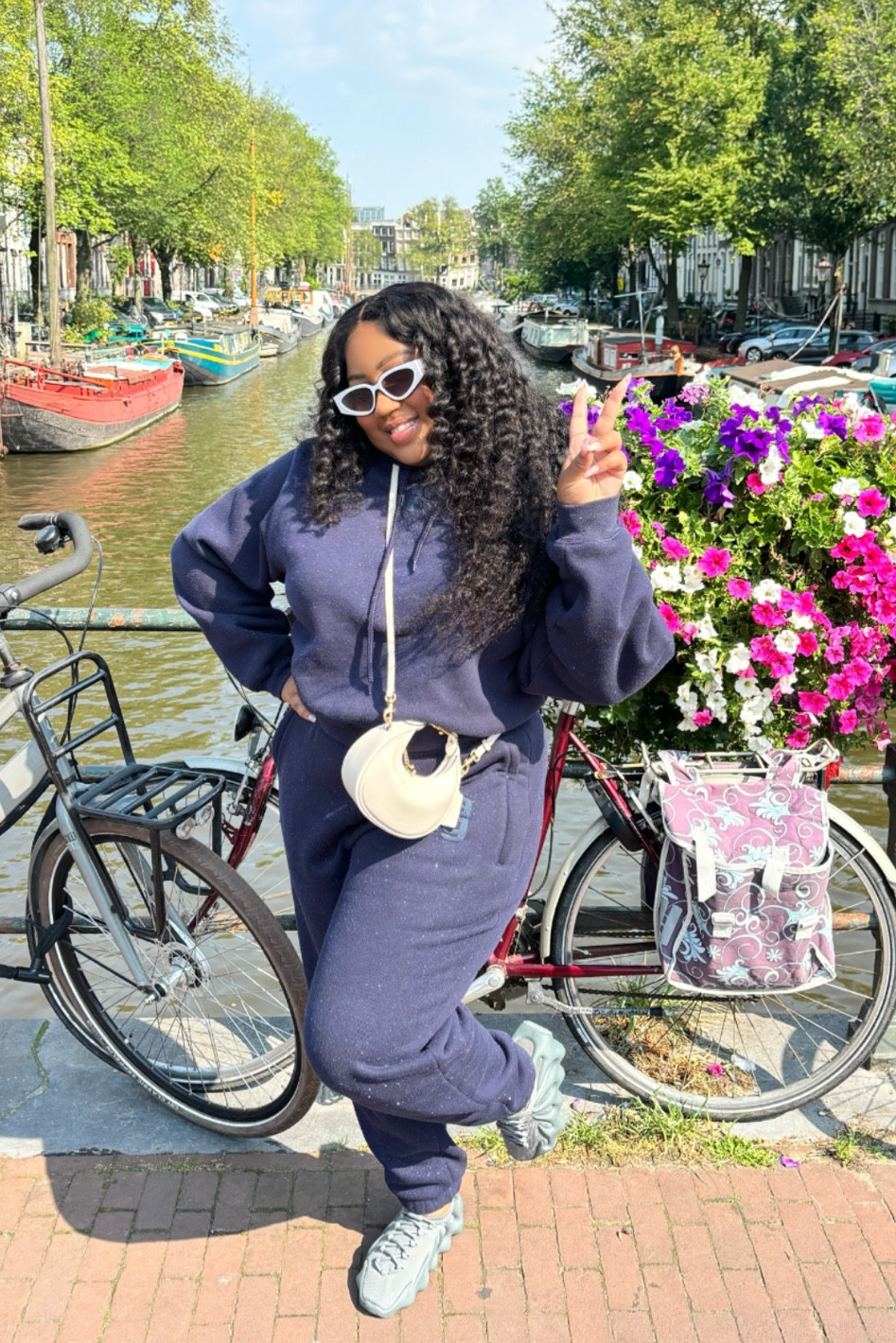 Exploring the charming canals of Amsterdam in cozy sweats! Wearing my fave Alexander Wang sweatsuit, paired with Yeezy sneakers and this sleek Coach purse. Click to shop my look and stay comfy & fashionable on your next adventure! #AmsterdamStyle #OOTD #AlexanderWang #CoachBag #Yeezys #TravelInStyle #LTKfit

#LTKTravel #LTKStyleTip #LTKxMadewell