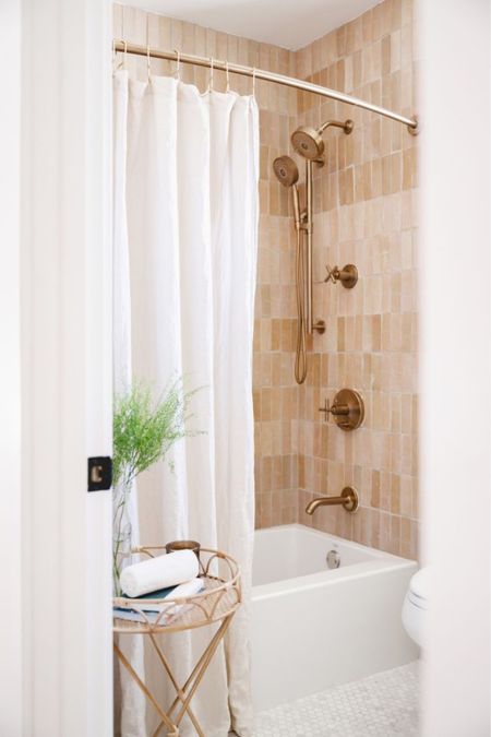 Organic bathroom

Earthy shower with zellige tile, bath mat, rattan side tile, shower curtain, Kohler shower system, bathroom decor. 

#LTKHome