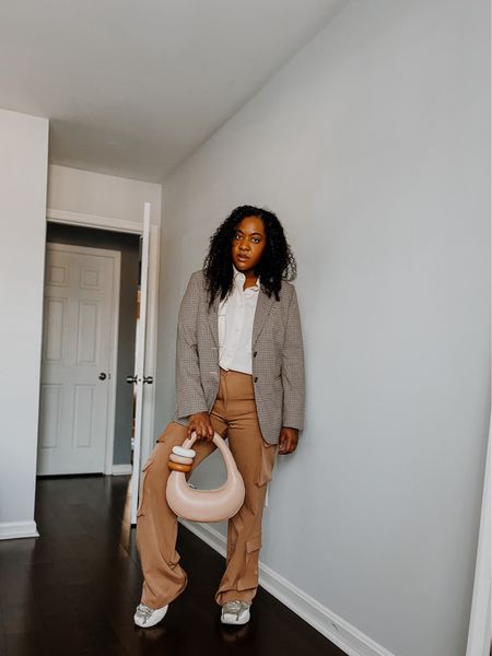How my top & blazer are business and the bottom are relaxed style. Loving how I can add a blazer to cargo pants. And I can still look stylish. Not only that pairing it with sneakers gives it such a street-style look! Give it a try! 

#LTKFind #LTKstyletip #LTKworkwear