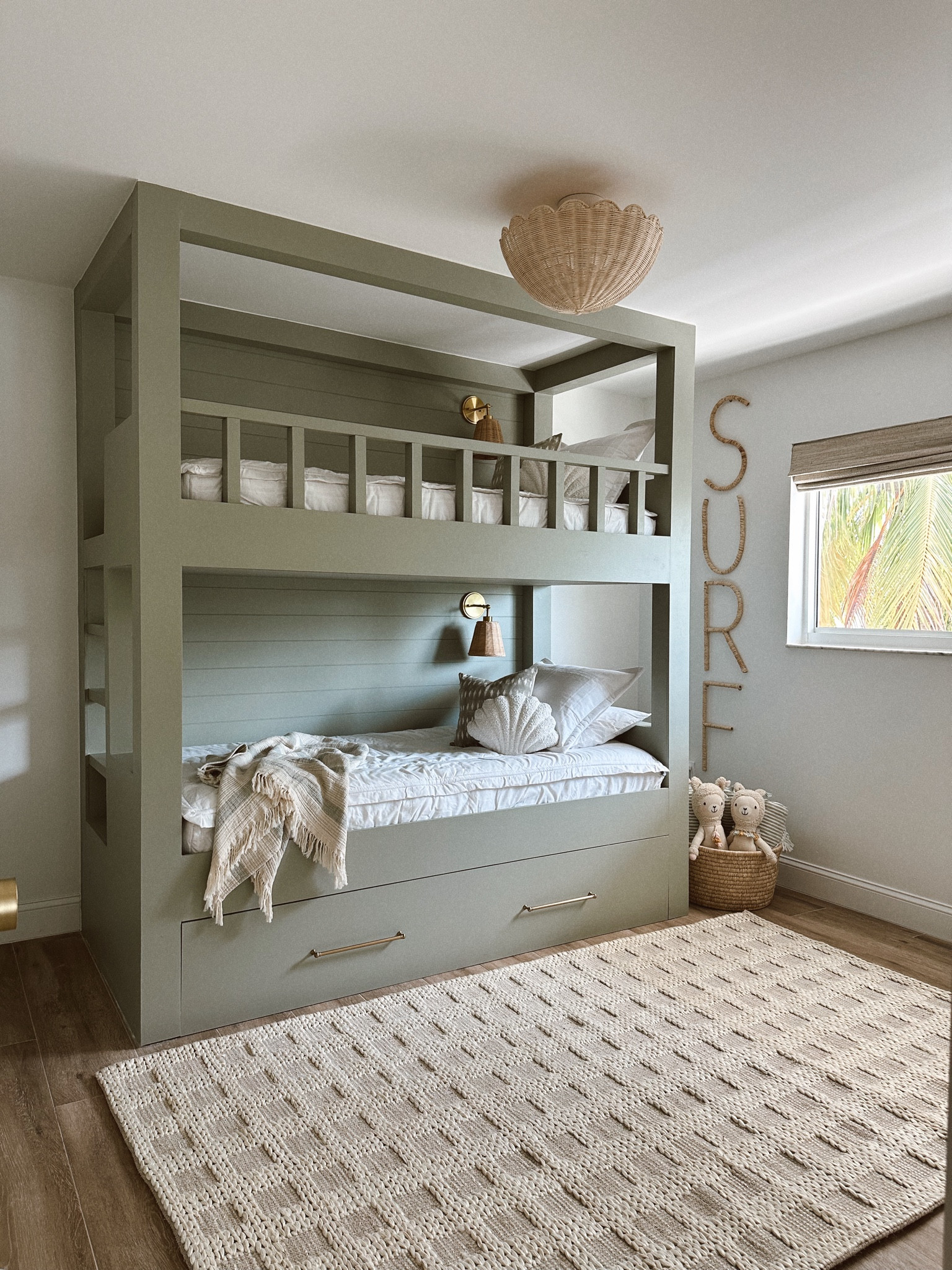 Sharing the links for my kids bunk room 🤍 my husband built our triple bunk but I found so many cute ones in a similar color ✨

#bunkroom #kidsroom #beachhouse #toddlerroom #kidsbunkbeds #rug #sconce #rattan #beachroom #girlsroom #boysroom #kidsbedroom 

#LTKHome #LTKKids #LTKFamily