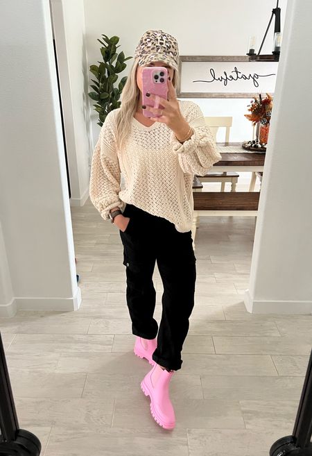 Sweater small
Cargo pants small
Pink rain boots tts
Astros hat
Fall outfit 
Rain boots outfit 

#LTKfindsunder100 #LTKshoecrush #LTKfindsunder50