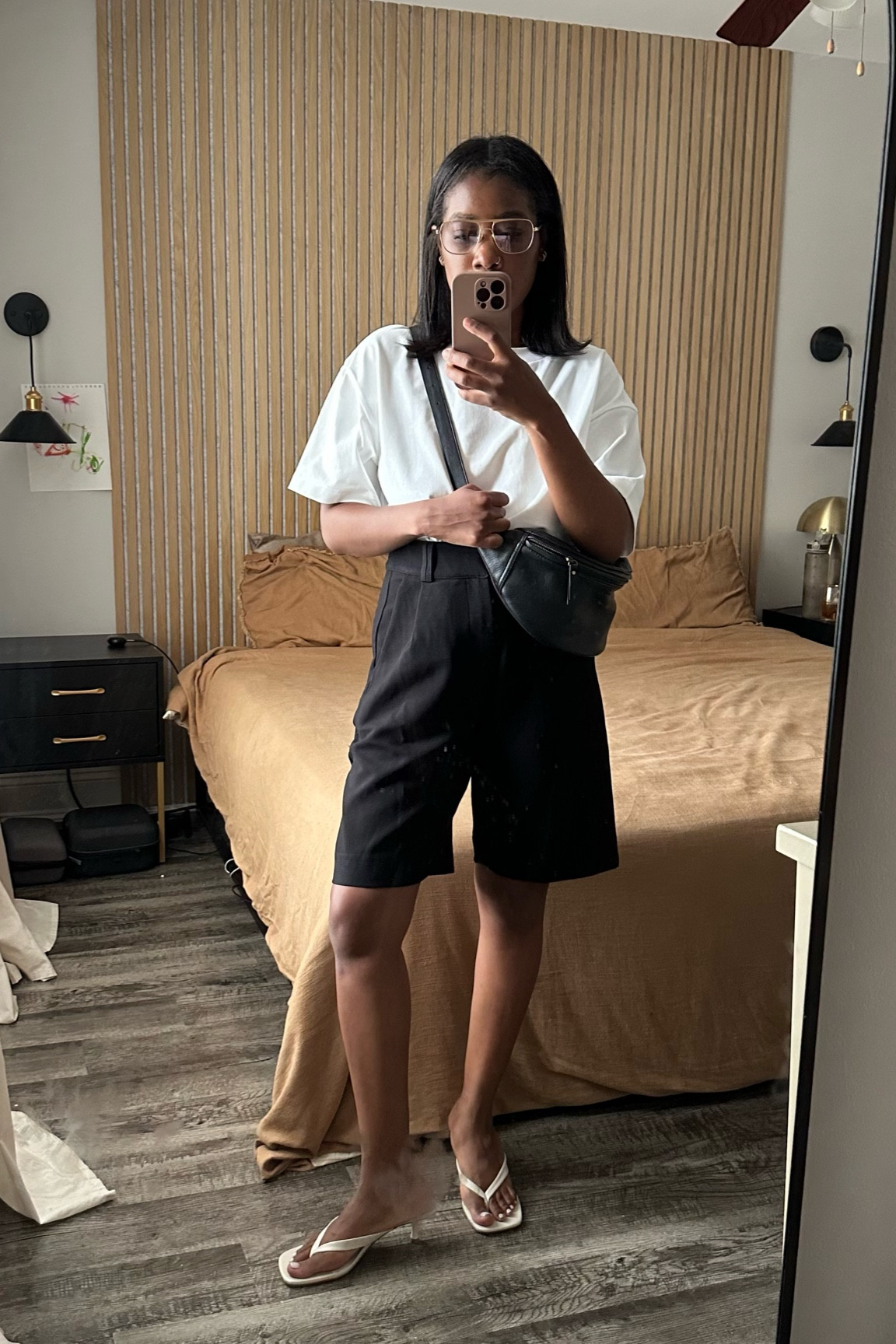 White oversized tshirt with black Bermuda shorts 

#LTKStyleTip #LTKFindsUnder100