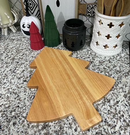 Love this tree serving board they also have a ginger bread man also great for holiday snacks and treats the small trees are from the dollar spot couldn’t find to link 

#christmas #treeboard #christmastree #servingboard #holidaytreats #charcuterieboard #holidaysnacks 

#LTKSeasonal #LTKHoliday #LTKhome