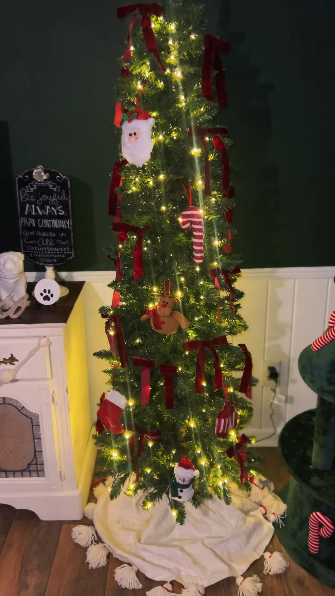 Simple and sweet 6ft pre-lit artificial pencil Christmas tree with red velvet bows and cute stuffed ornaments 

#LTKFindsUnder50 #LTKHome #LTKHoliday