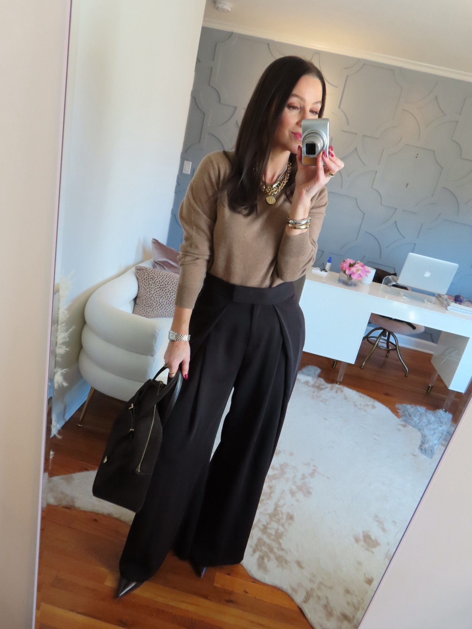 Size DOWN one in the pants. Sweater true to size  