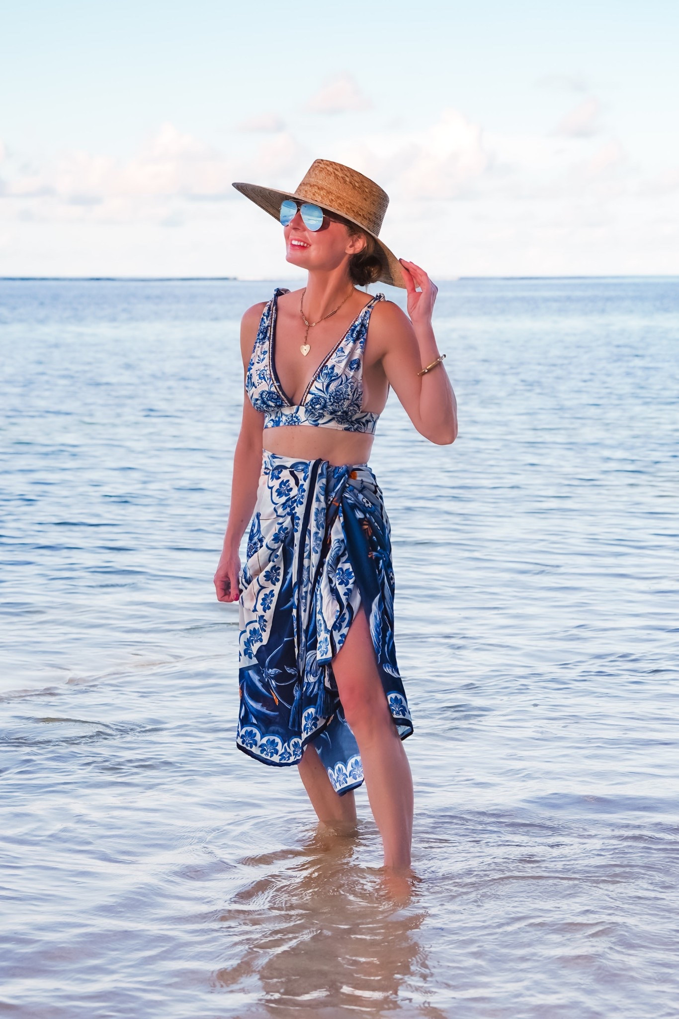 These coordinating blue and white swim separates are so chic and flattering! The high-waisted bottoms are reversible too. Fits run true to size. 

~Erin xo 

#LTKTravel #LTKSeasonal #LTKSwim