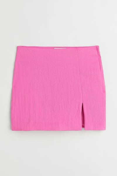 Short skirt in a linen and viscose weave with a regular waist, concealed zip in one side and a sl... | H&M (UK, MY, IN, SG, PH, TW, HK)