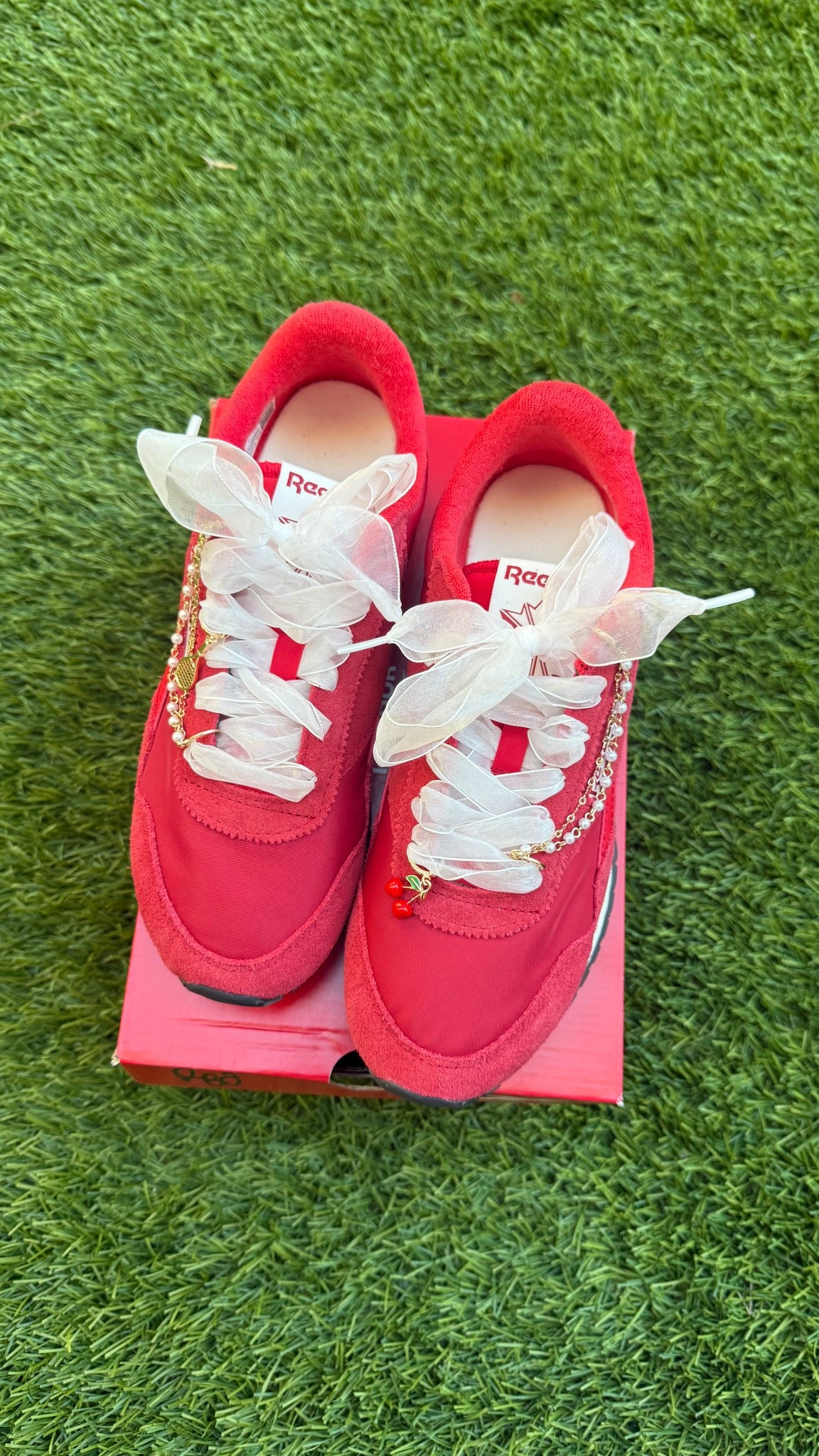 got the cutest tennis shoes from anthro today!! added new laces and charms 🍒 

#LTKStyleTip #LTKFindsUnder100 #LTKSeasonal
