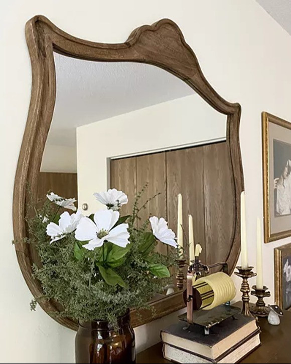 Arched Antiqued Inez Mirror by Magnolia Home | Wood Antique Vintage Mirror, Farmhouse, Home Decor

Wood carved details and a unique shape give the Inez Mirror a collected look. Exclusive to Magnolia, this mirror adds character to any space, whether displayed on a mantel, hung on a wall, or set atop an entry table.
 

 #LTKmomlife #LTKOver40 #LTKHome