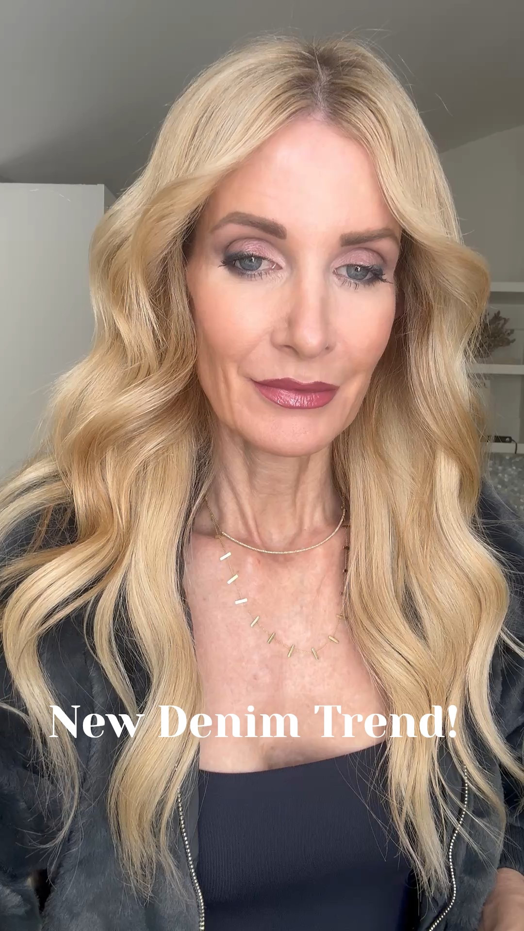 New denim trend for 2026 is HERE 🖤 These leg-lengthening Anine Bing jeans have the perfect high waist + wide leg silhouette, plus a subtle slit that gives them that “cool girl” vibe. I paired them with a navy bodysuit + faux fur bomber for an easy date night or dinner look. I’m wearing a size 24 in the jeans and they fit TTS. 

 #LTKSeasonal #LTKOver40 #LTKSaleAlert