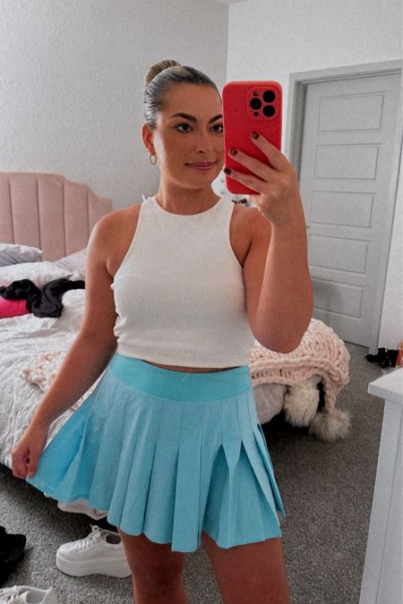 Todays Disney fit for the parks! White workout racer back tank, blue turquoise pleasured yoga skirt, white sneakers 
| workout skirt | magic kingdom | vacation outfit | casual | athleisure 

#LTKstyletip #LTKtravel #LTKfitness