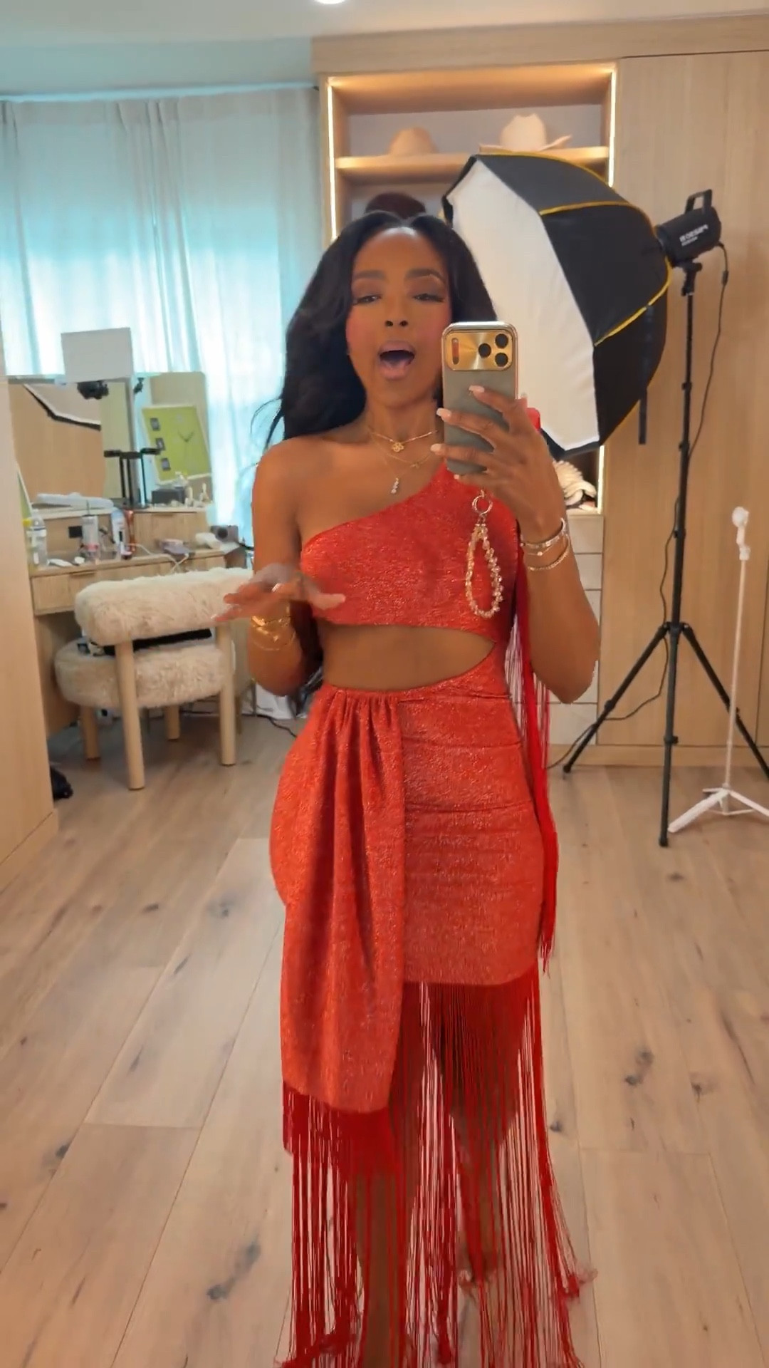 A bold moment with maximum movement — this one-shoulder red dress brings all the drama with its sculpted cutout, soft shimmer, and cascading fringe that sways with every step. The asymmetric shape adds that high-impact feel without losing its elegance.

The vibrant tone paired with the textured drape makes this such a standout piece for nights when you want something unforgettable and effortlessly glamorous.

Perfect for holiday parties, birthday dinners, and any event where you’re ready to make an entrance.

📏 Sizing: Small  
Height — 5’4”  
138 lbs  
Bust — 34D  
Waist — 27”  
Hips — 40”  
For pants/jeans: 27 Long or 4 Long

Shop instantly on the app

Statement dresses, fringe detailing looks, bold red outfits, night-out styling inspiration, eye-catching silhouettes, glamorous event wear.

Follow me on Instagram and YouTube @kirasfashionfinds



#LTKgrwm #LTKootd