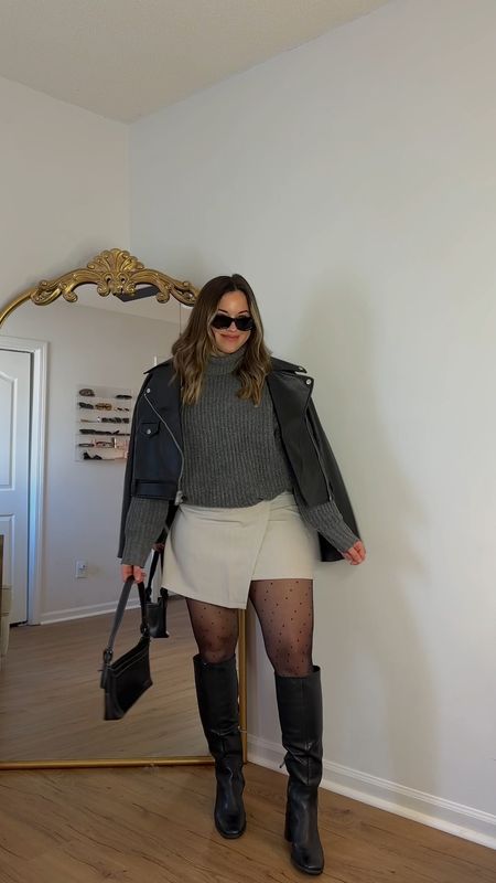 Skort is true to size - could have sized up for looser fit. Sweater is slightly oversized. Sized up in moto jacket. Boots are true to size! 

#LTKMostLoved #LTKstyletip #LTKSeasonal