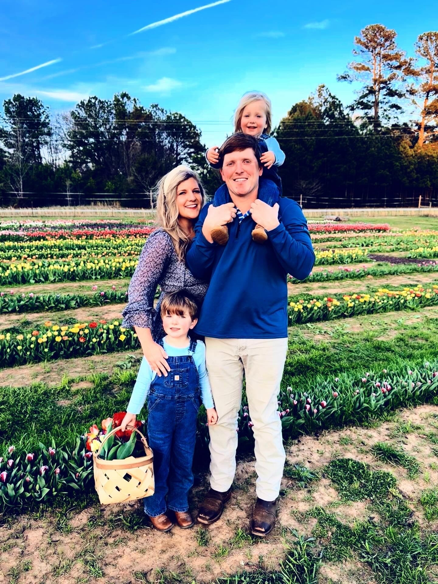 Oh just the 🌷 d r e a m i e s t 🌷 friday night at the flower farm 🚜 picking tulips 💐 at sunset 🌅 with our babies!! 🤱🌼👶🏼🌱🐐🧺🐑🌾🫏 Spring is in the air ☀️ and the tulips are ready for springtime just like us!! 🫶🏽 What a joy it is being surrounded by all my handsome country boys!!! 🤠🩵 #springfridaynights #tulippicking #tulipseason #flowerfarm #springisintheair